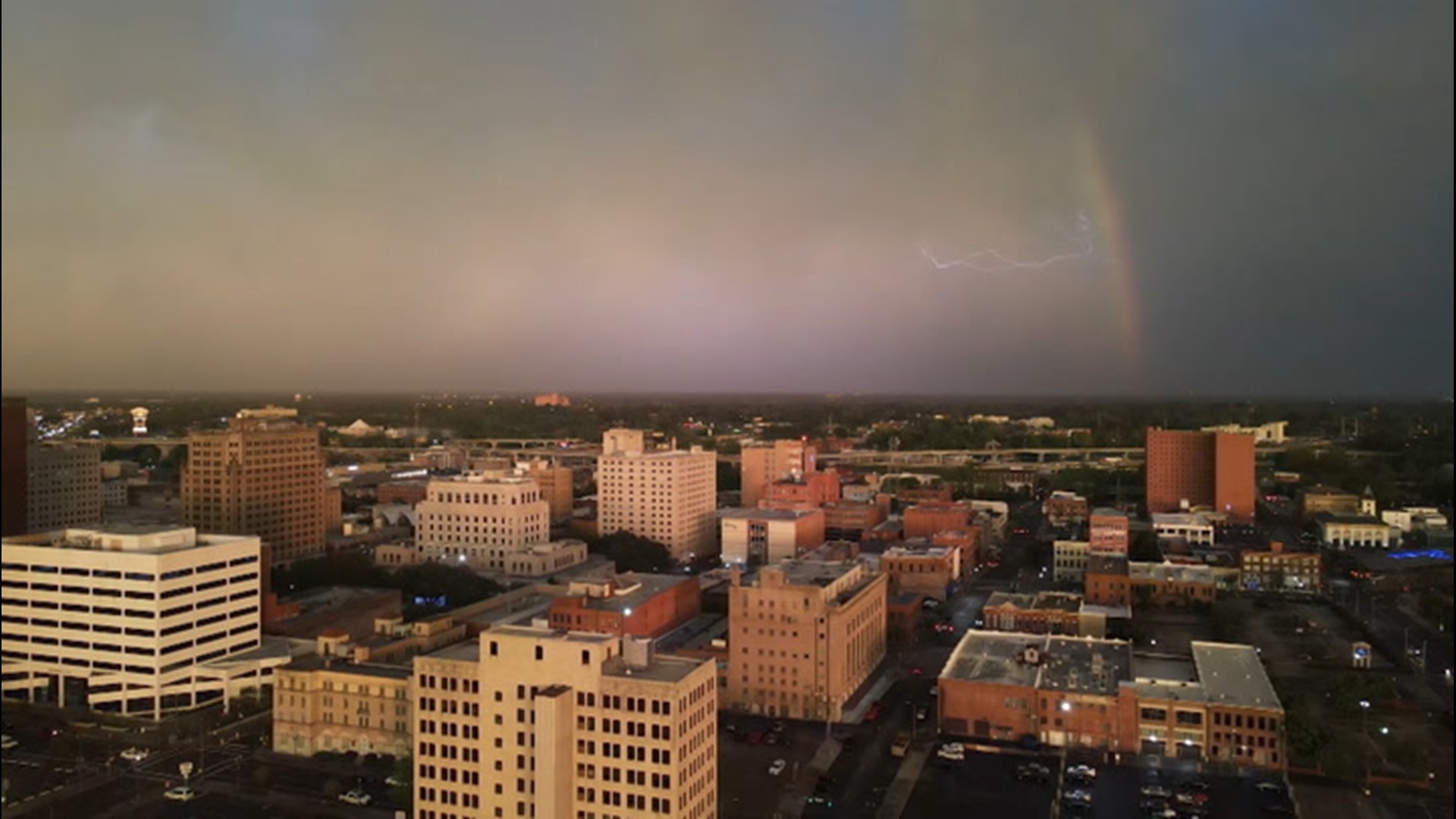 Drone footage captured lightning streaking across the sky behind a rainbow above the Shreveport skyline in Louisiana, on April 9, as a storm rolled through the area.