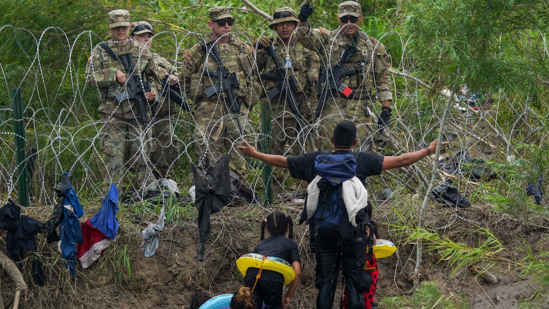 Migrants rushed across Mexico's border hours before pandemic-related asylum restrictions were to expire on Thursday.