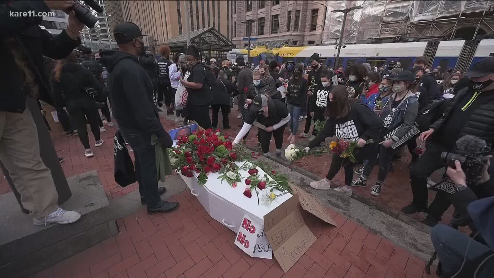 The march at the Hennepin County Government Center mourns George Floyd and calls for justice and policing reform.