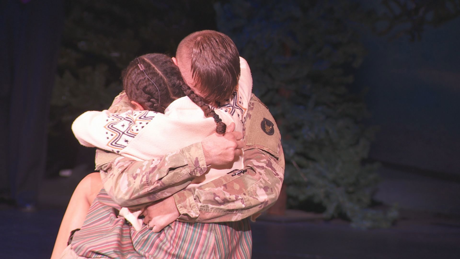 WATCH Soldier reunites with stepdaughter on stage during play