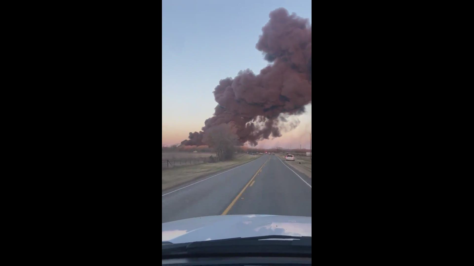 WARNING: Video contains graphic language. Ryan Kyburz captures video of fire where an 18-wheeler and a train collided on 2095-FM in Cameron after 7 a.m. Tuesday.