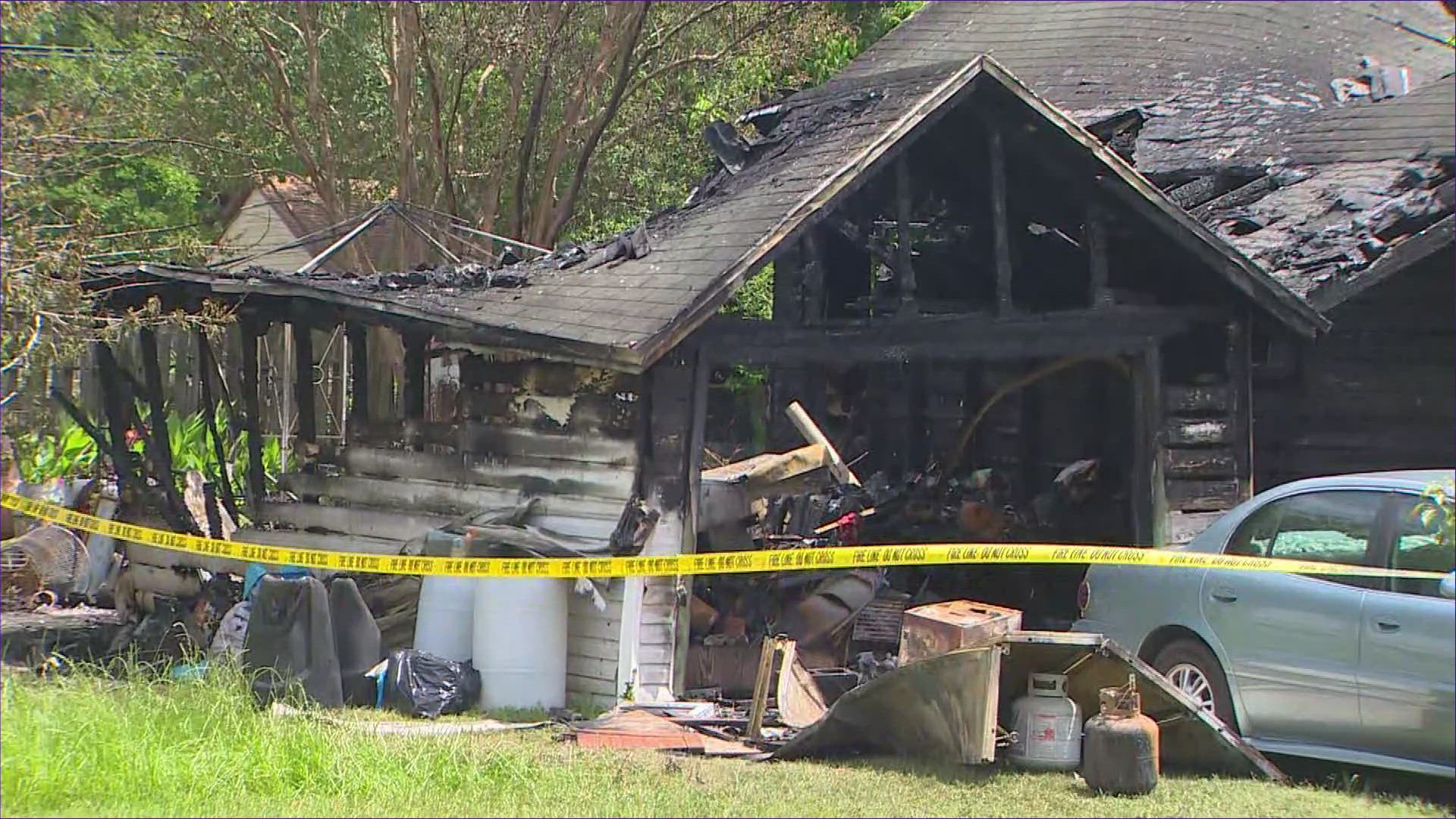 Fire conditions were so bad that firefighters weren't able to rescue the woman who was trapped in the burning home, officials said.