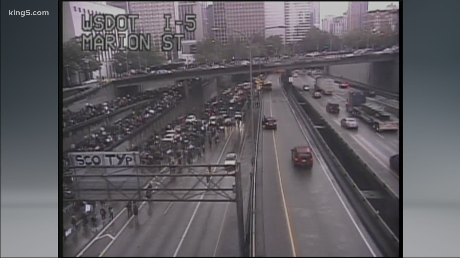 Both directions of I-5 through downtown Seattle were shut down after chaotic protests spilled onto the freeway Saturday.