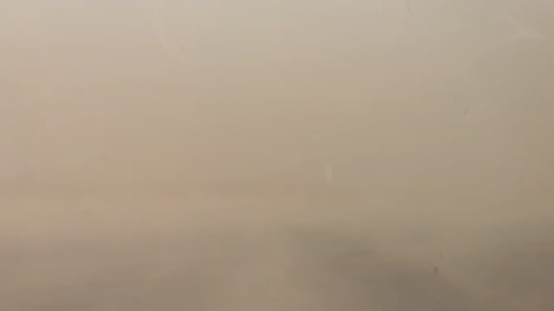 Here's what it looks like inside a dust storm in Arizona. If you're caught on a road, pull far off to the side, turn off your lights and take your foot off the brake.