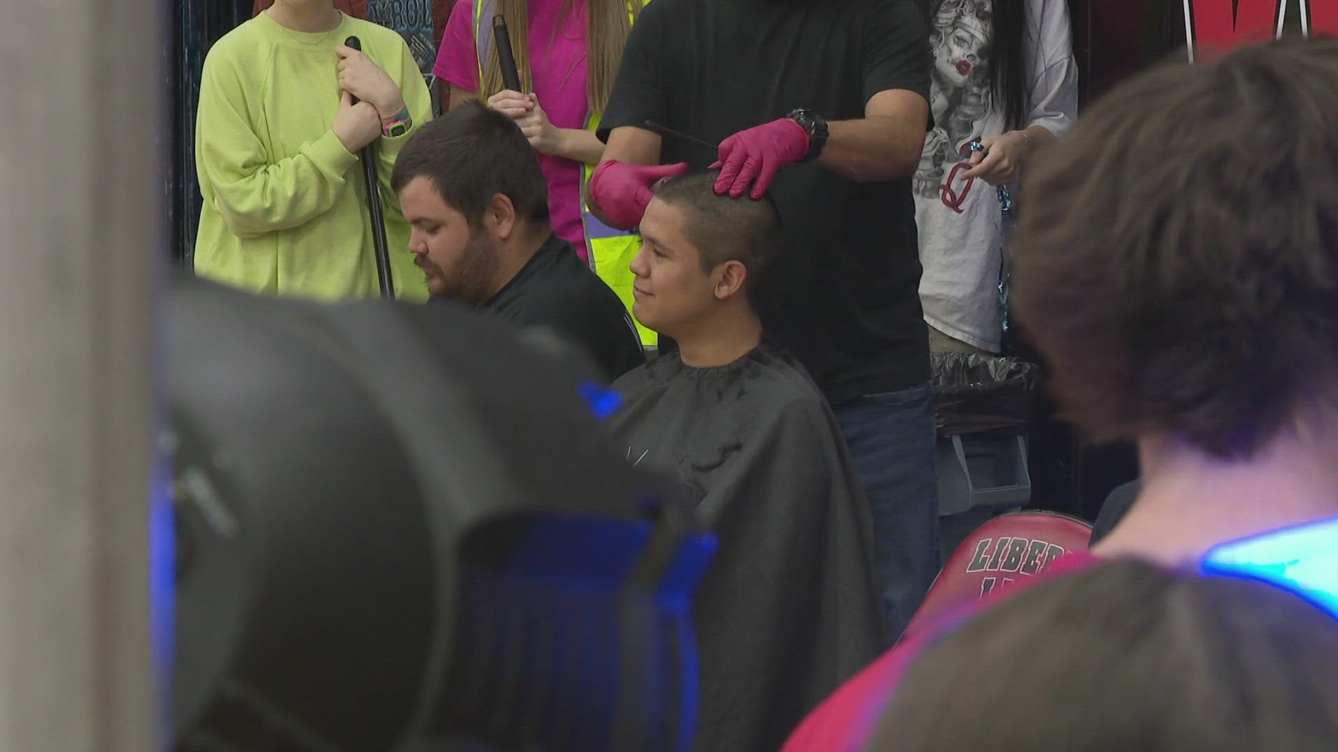 Students shaved their heads in solidarity with one of their geometry teacher who was recently diagnosed with an aggressive form of cancer.