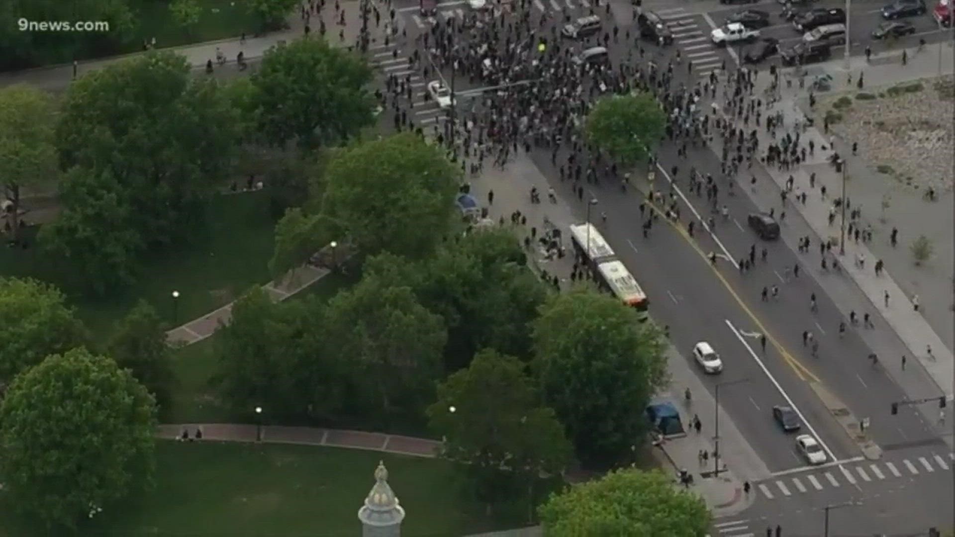 Protesters gathered at the Colorado State Capitol Thursday and marched downtown to call for action after the death of George Floyd.