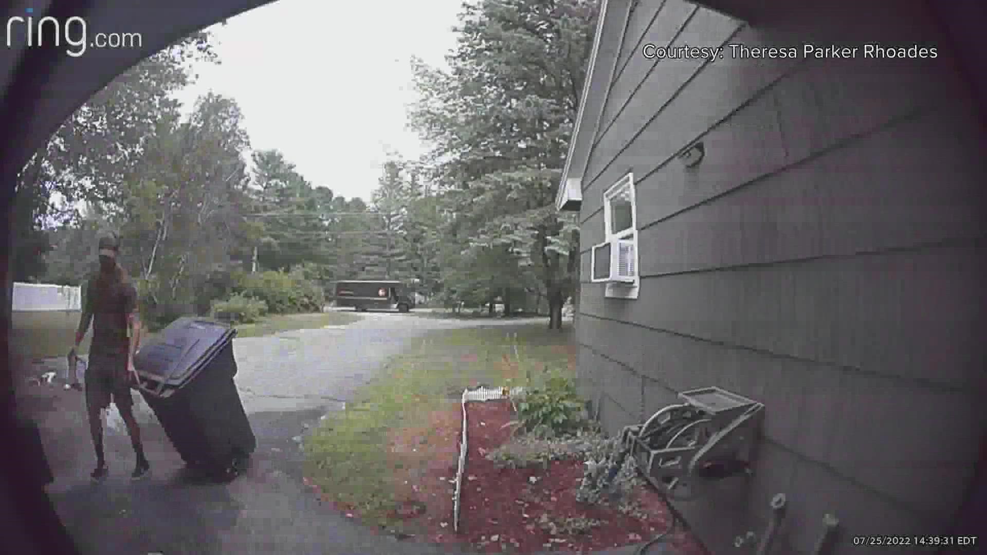 Maine UPS driver brings in trash can