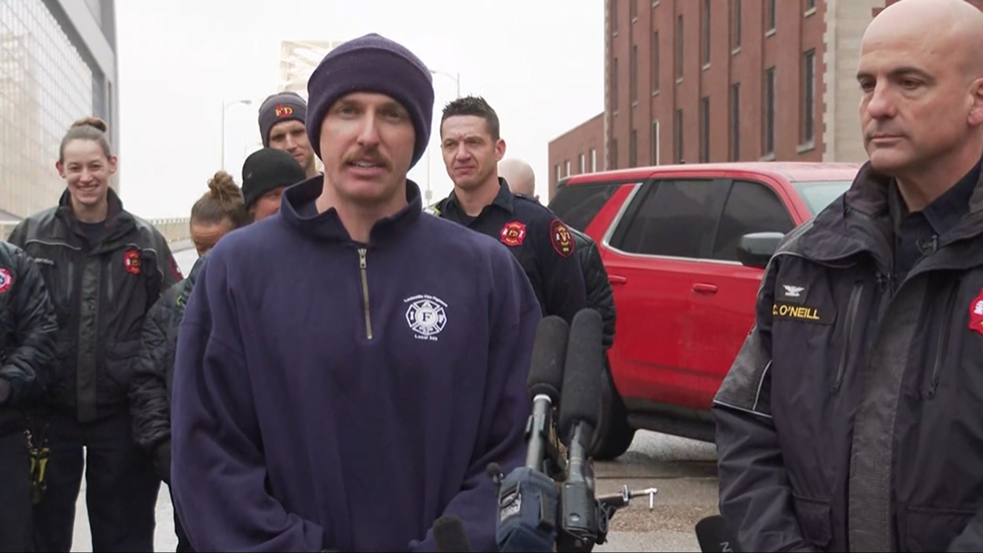 The scary, intense scene unfolded on the Clark Memorial in Louisville on Friday. Firefighter Bryce Carden said he prayed with the woman as he got her to safety.