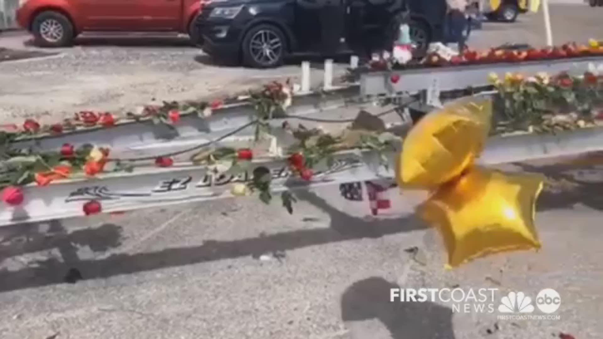 flowers, ribbons adorn boat trailer of missing jfrd