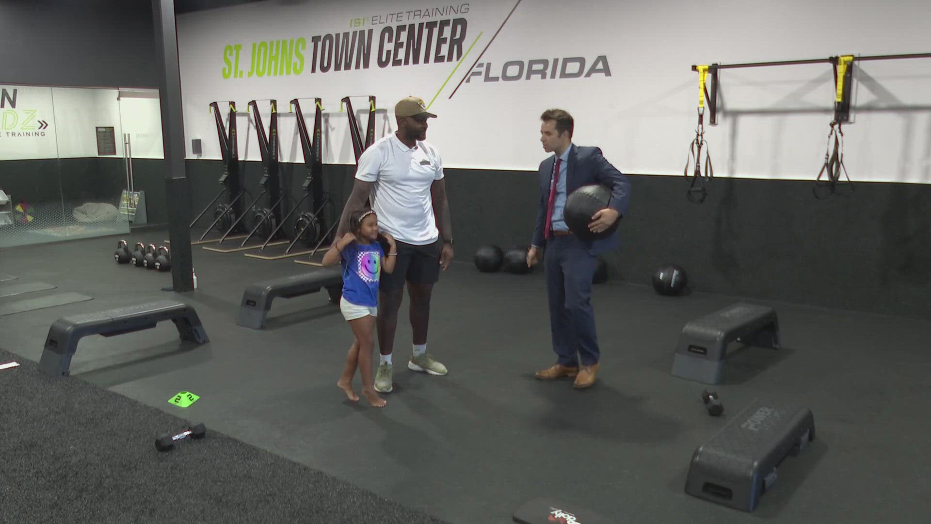 Former Jaguar Neal Sterling of ISI Elite Training in the St. Johns Town Center joined GMJ for a quick fitness lesson with the help of his daughter.