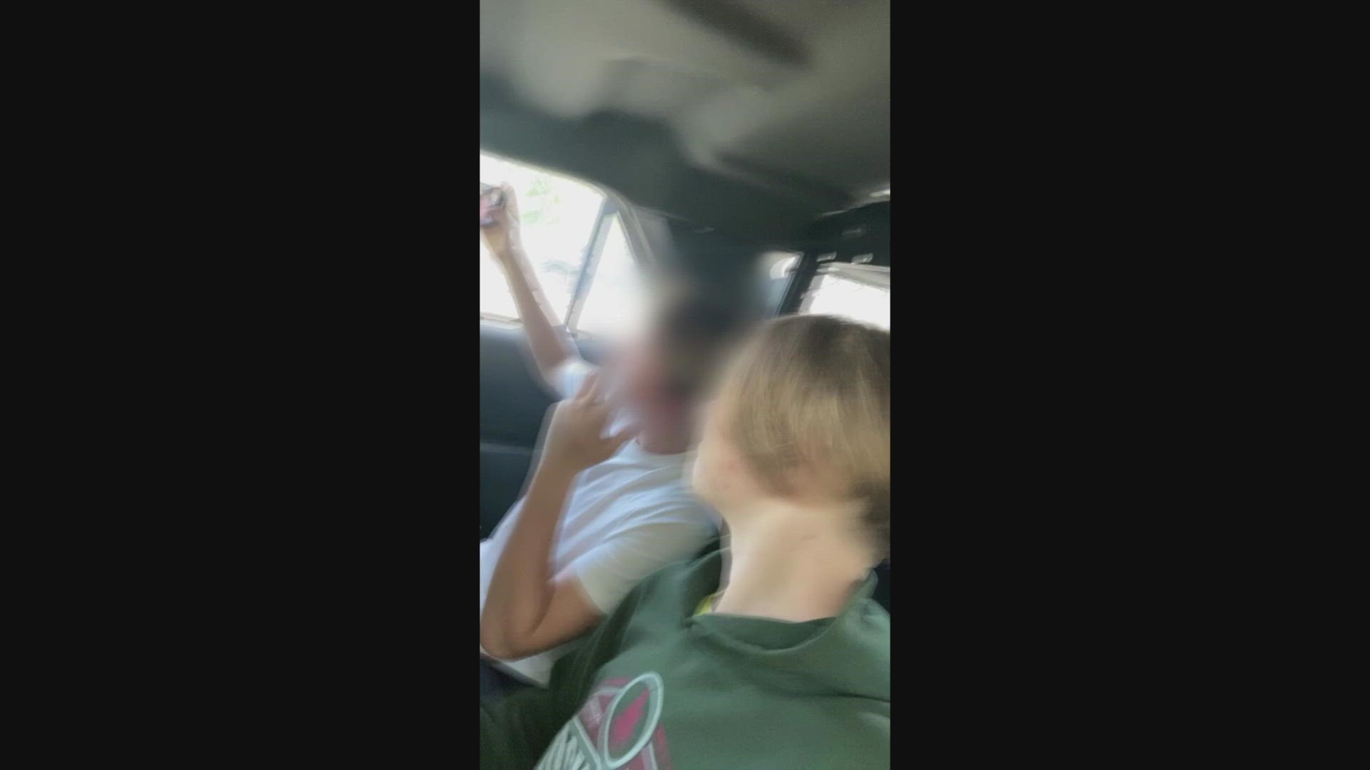 Video appearing to be from Aiden Fucci's social media shows him in the back of a police car after investigators say he killed Tristyn Bailey.