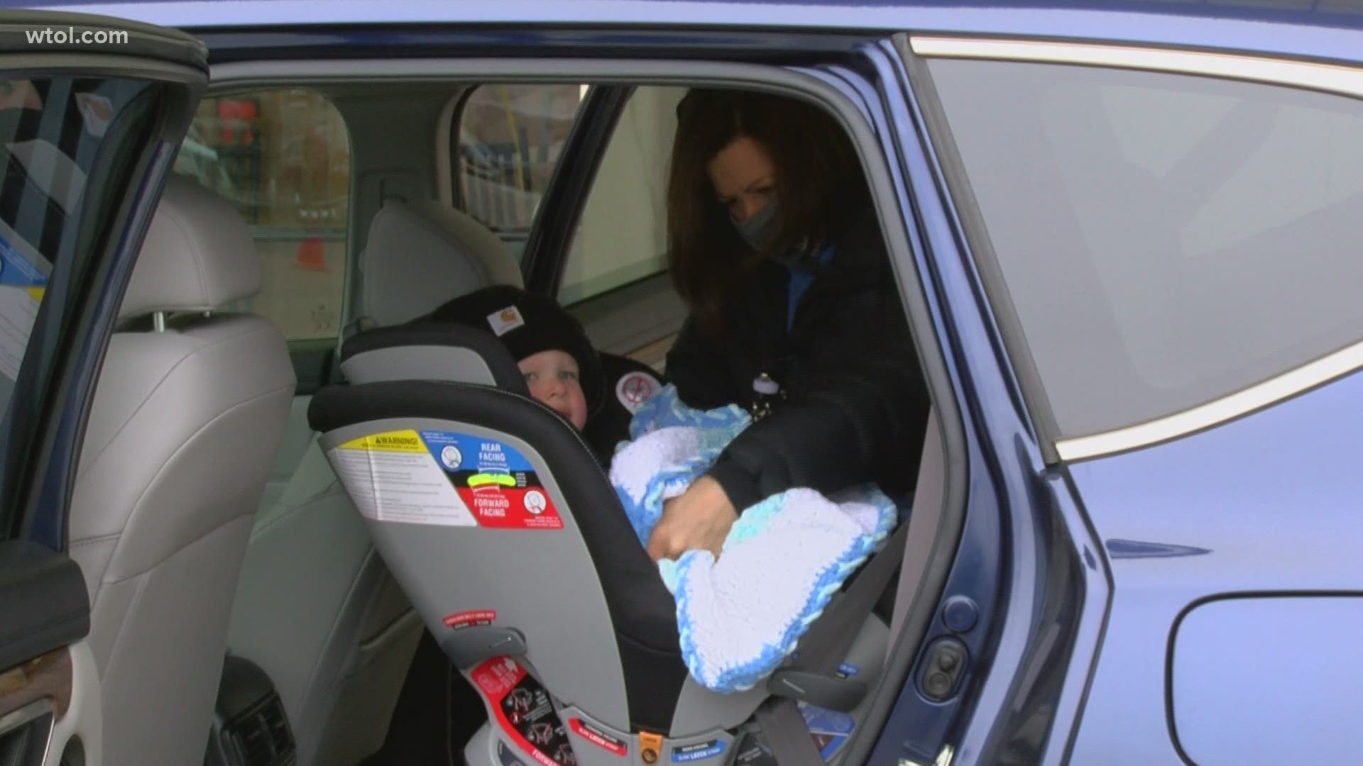 A safety expert says thick, fluffy coats could interfere with car seat harnesses.