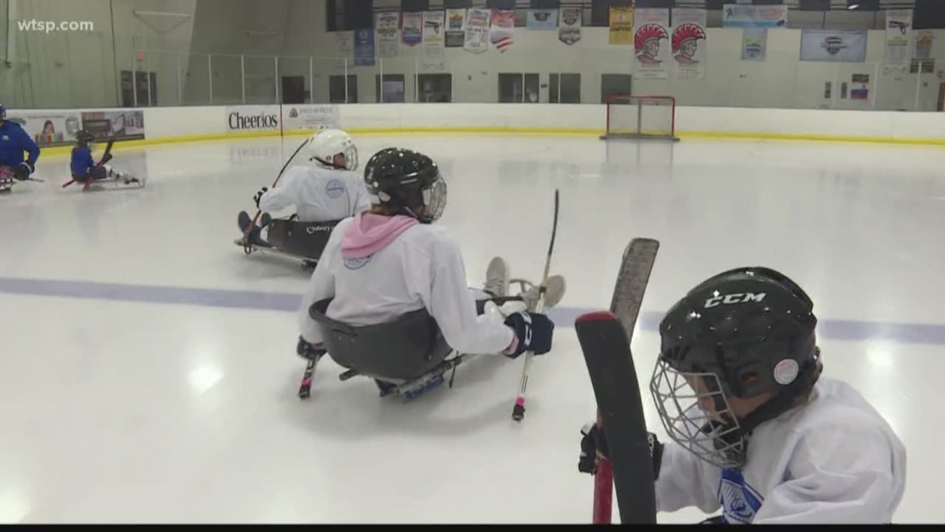 Together they helped children in wheelchairs play some sled hockey.
They got to dress up in the gear, find a sled and have some fun.
And one lucky kid was surprised with a Lightning-themed hand trike.