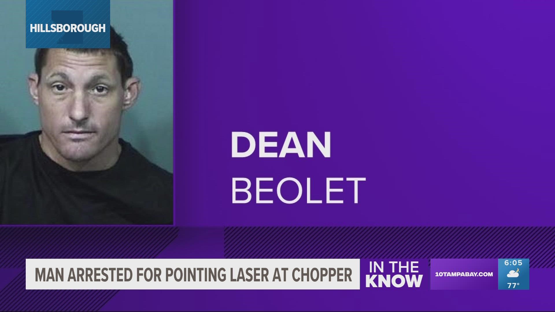 While searching for a different suspect, the 33-year-old man reportedly decided to shine a laser at the chopper "multiple times."