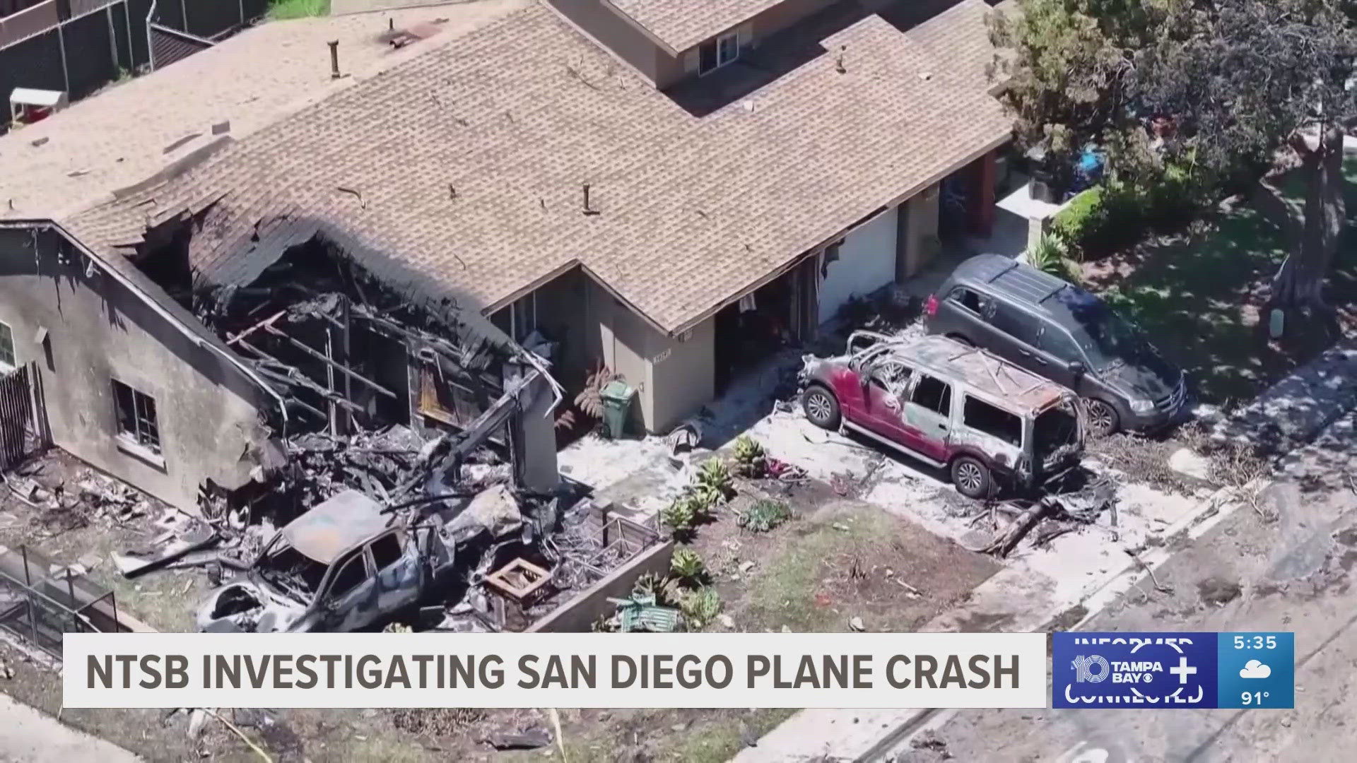 At least two people aboard the plane were killed, with four others presumed dead, according to authorities.
