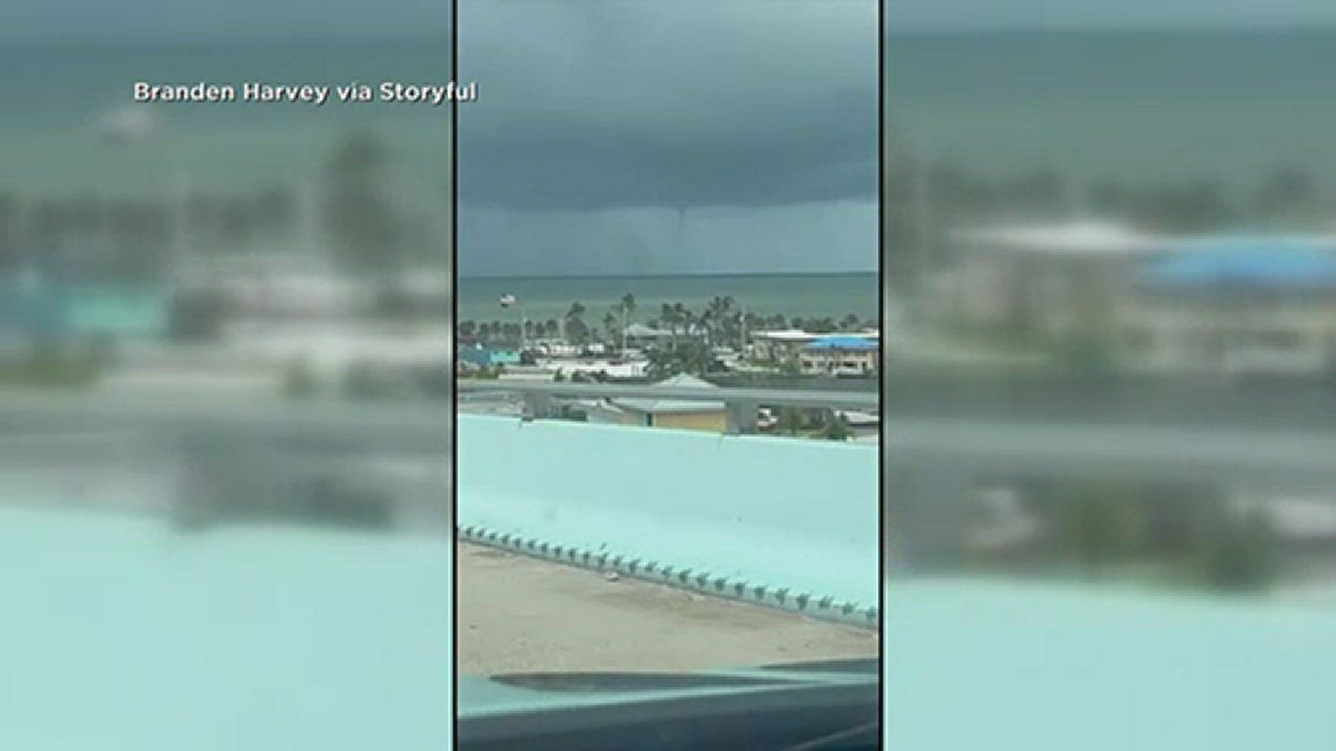 As severe weather moved through Southwest Florida on Wednesday people captured photos and videos of multiple waterspouts.