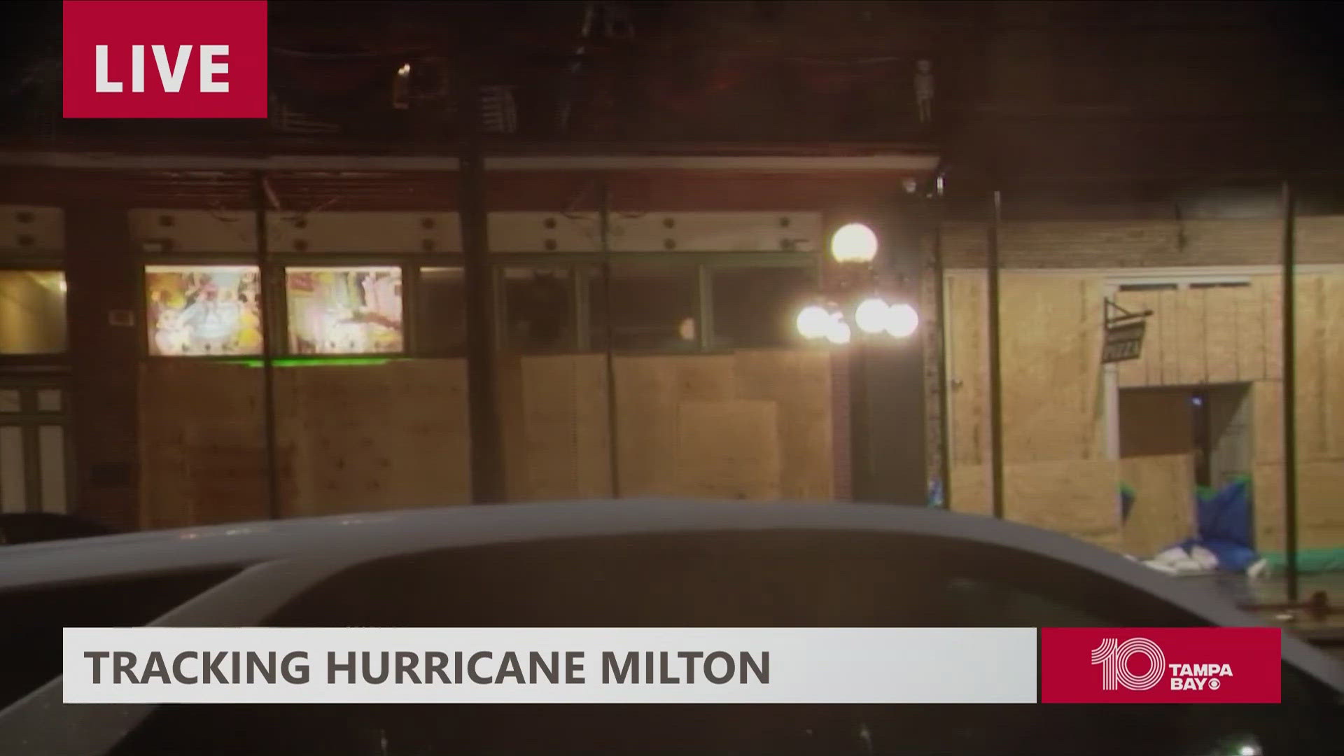 Hurricane Milton has slightly weakened to a Category 3 storm as it approaches Florida's Gulf Coast, the National Hurricane Center said.