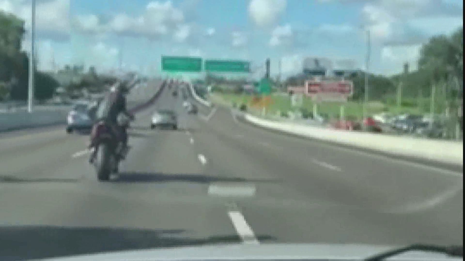 Police caught one motorcyclist doing a wheelie in traffic and another going 156 mph.