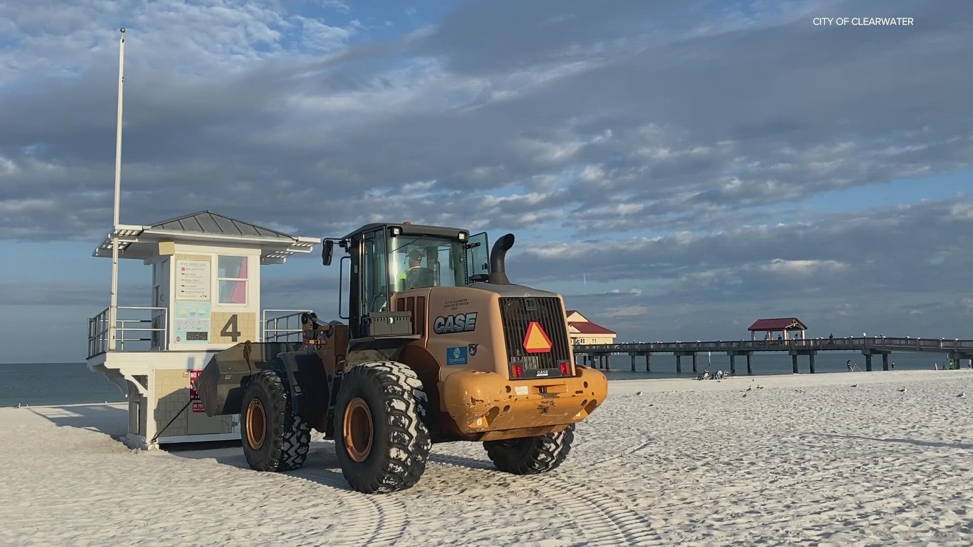 Crews moved the lifeguard stands Monday, Sept. 26, on Clearwater Beach, Florida, ahead of likely impacts from Hurricane Ian.