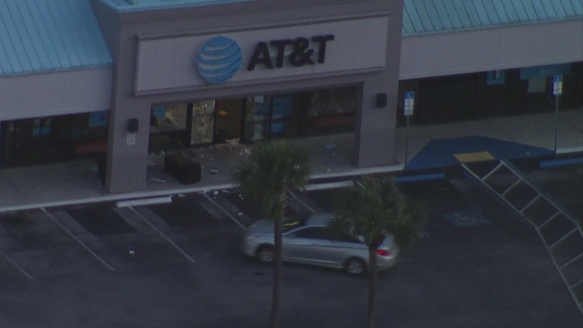 People were seen breaking into an AT&T store on E. Fowler Avenue. Several went inside and appeared to loot the business before officers could make a few arrests.