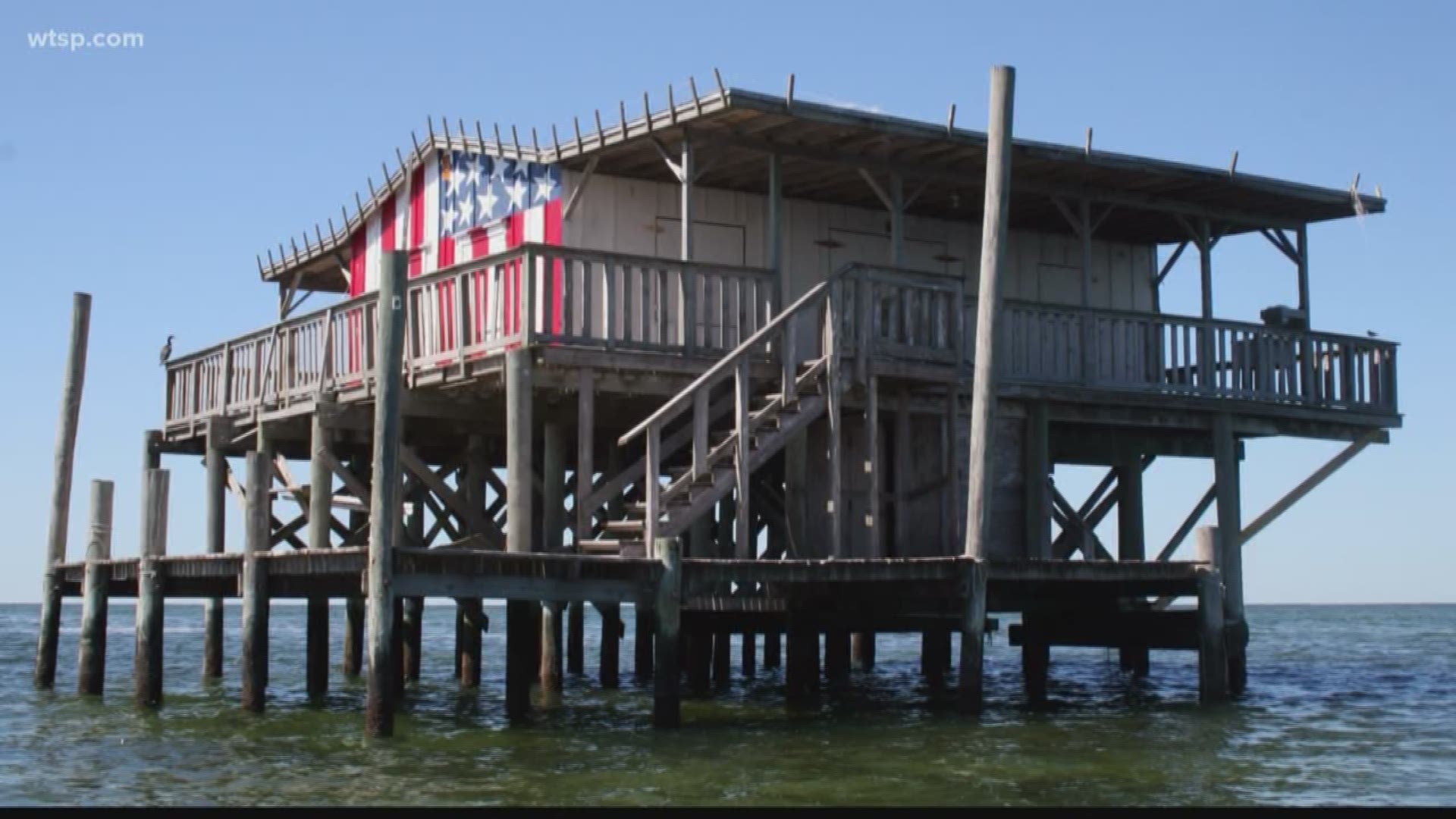 Port Richey family vows to rebuild its iconic American flag stilt house ...