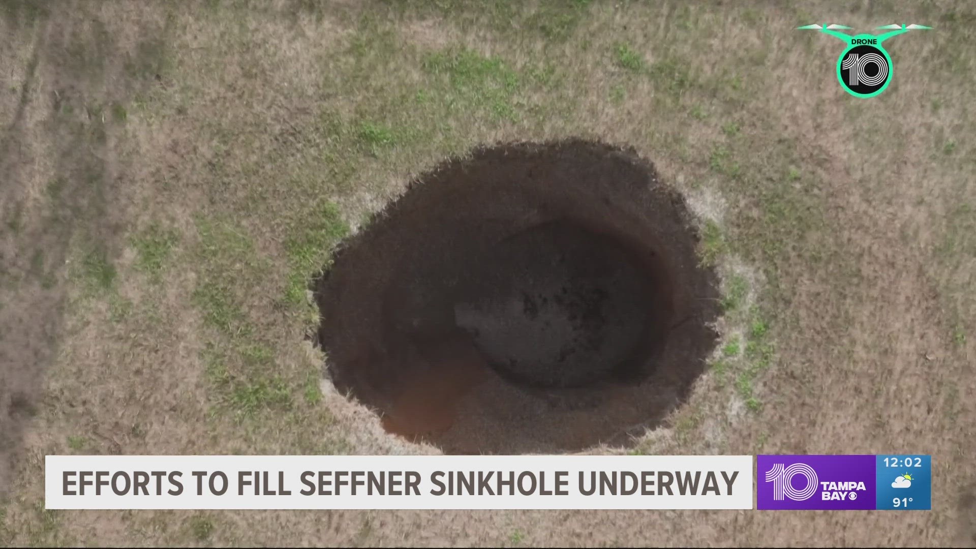County workers are filling the sinkhole with gravel and trying to prevent other sinkholes from opening in the area.