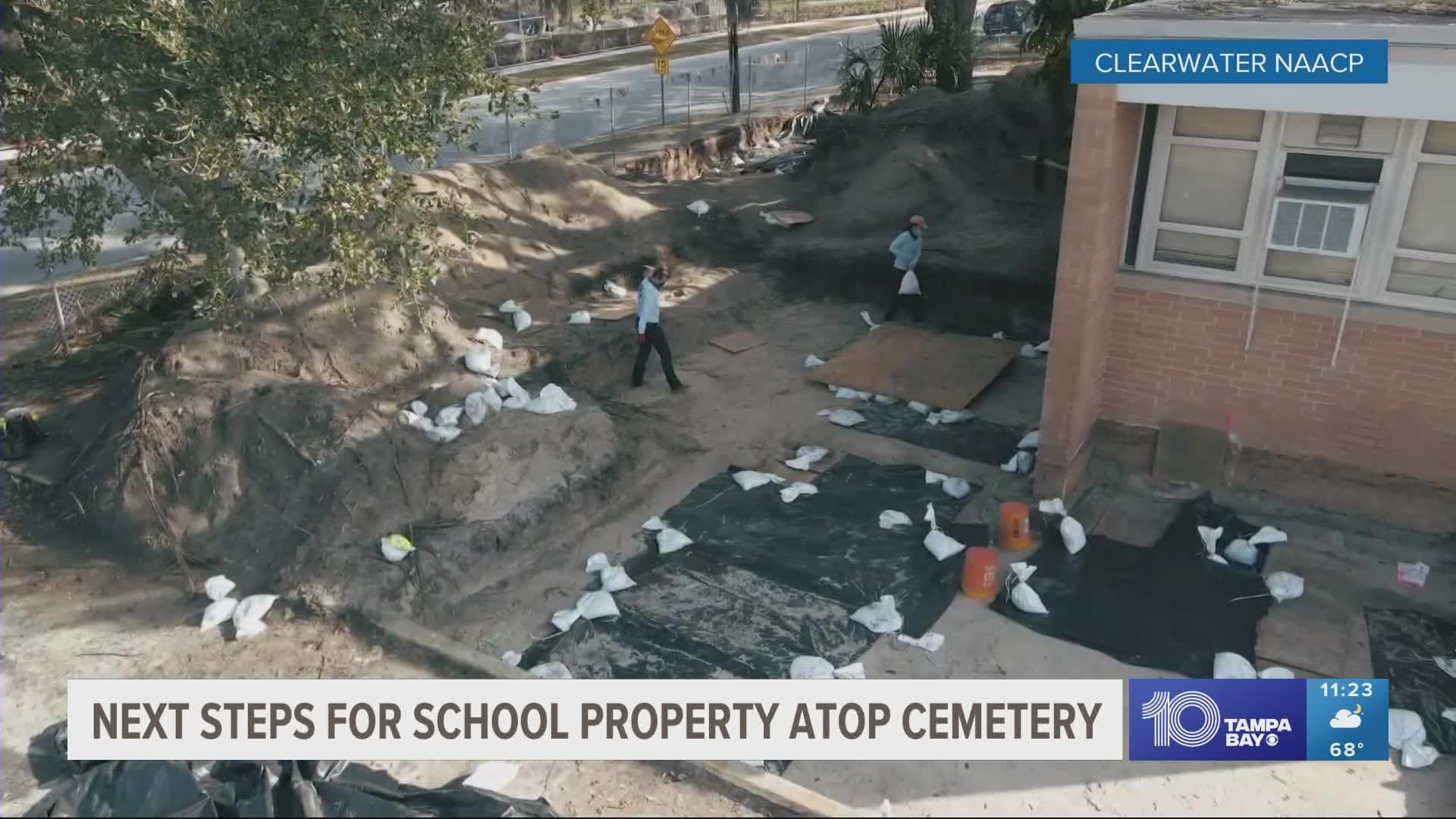 Archeologists found 54 graves from North Greenwood Cemetery under Curtis Fundamental Middle School, which was built on top of the destroyed cemetery.