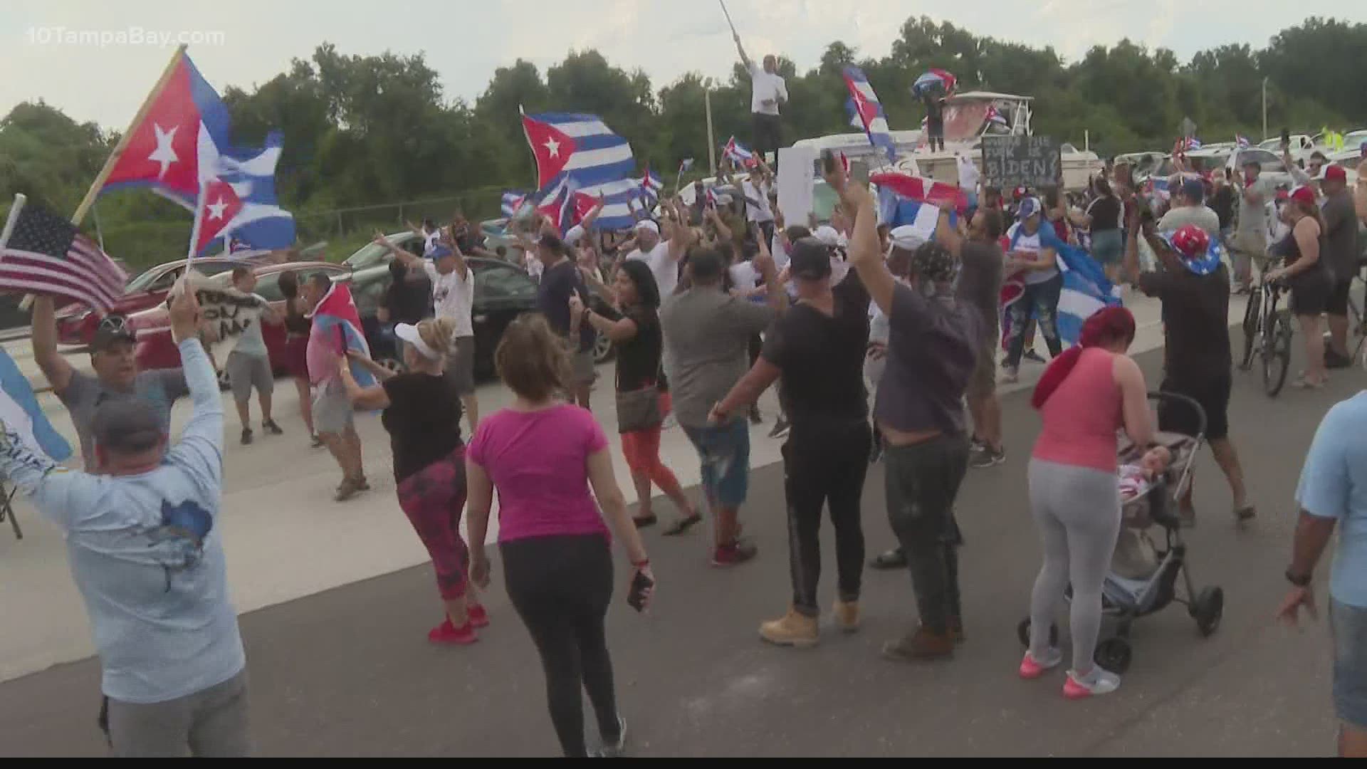 Demonstrators in support of the Cuban people marched along major roadways in Tampa and, at one point, attempted to get onto Interstate 275.