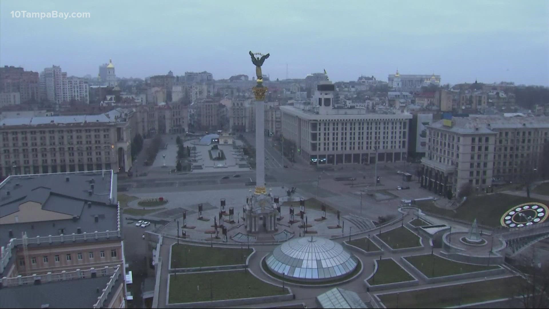 Explosions sounded before dawn in Kyiv as Ukraine's president pleaded for international help.