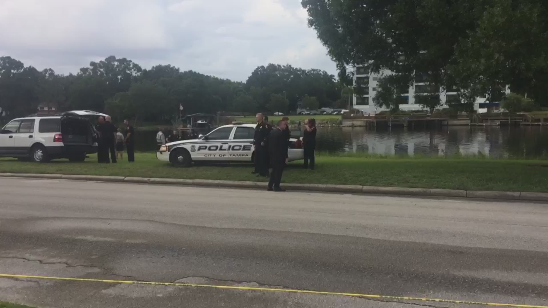 A young child has died after being found unconscious in the Hillsborough River. Police say a woman believed to be the child's mother dumped her into the river. That woman is in custody.