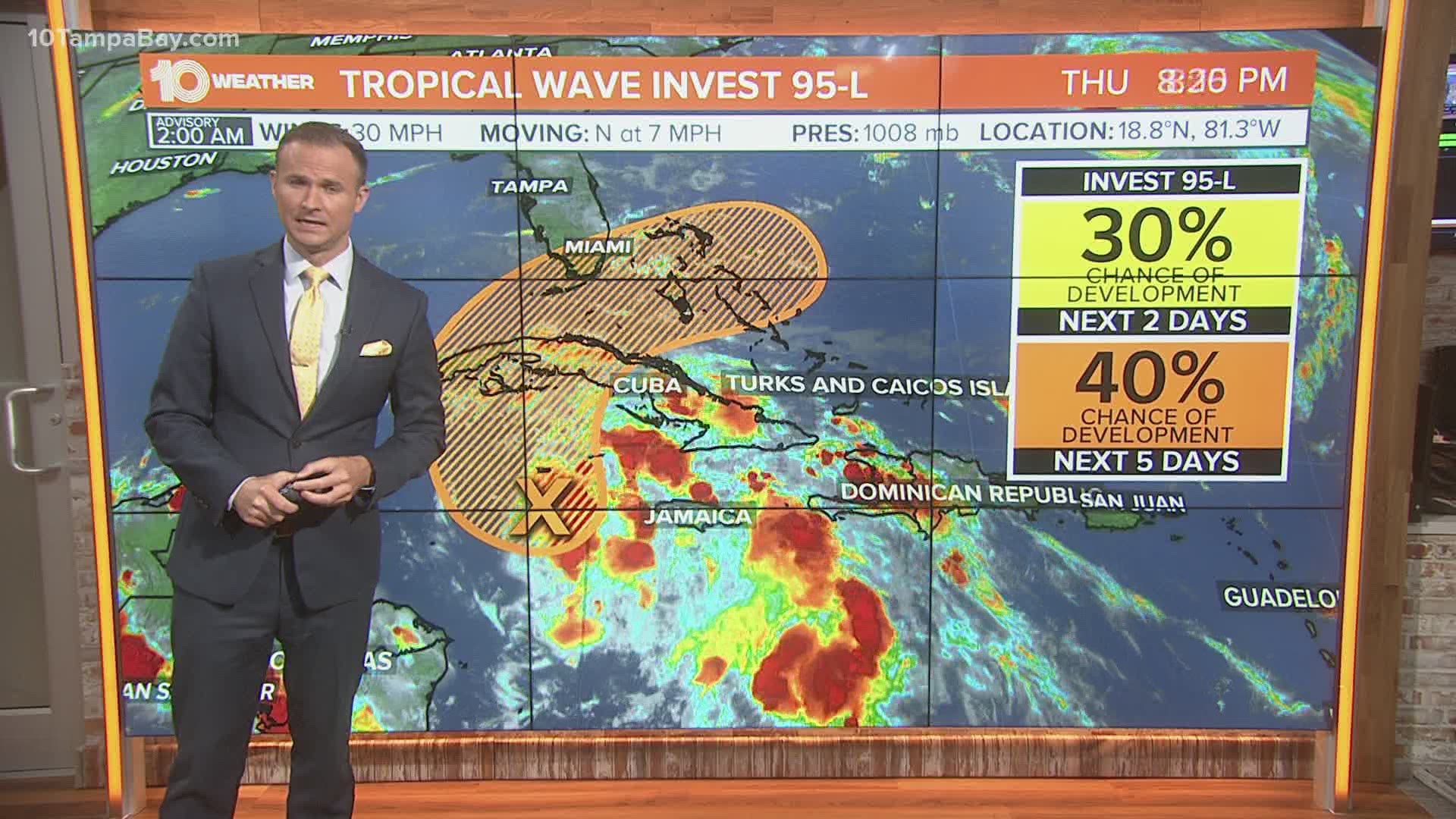 Tropical wave near Jamaica designated Invest 95-L.