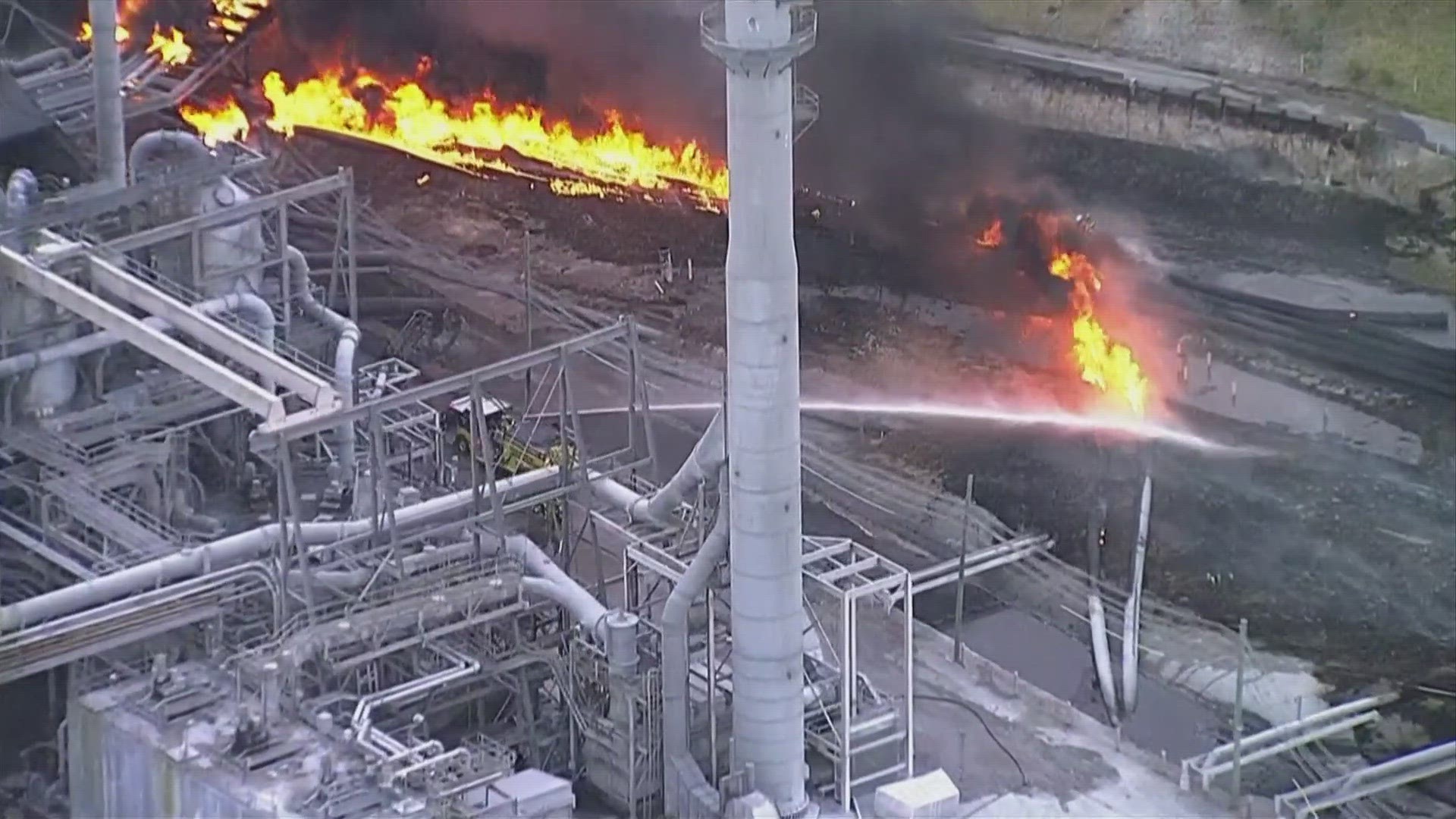 Aerials from Sky 10 show a large cloud of black smoke billowing from the Mosaic property.