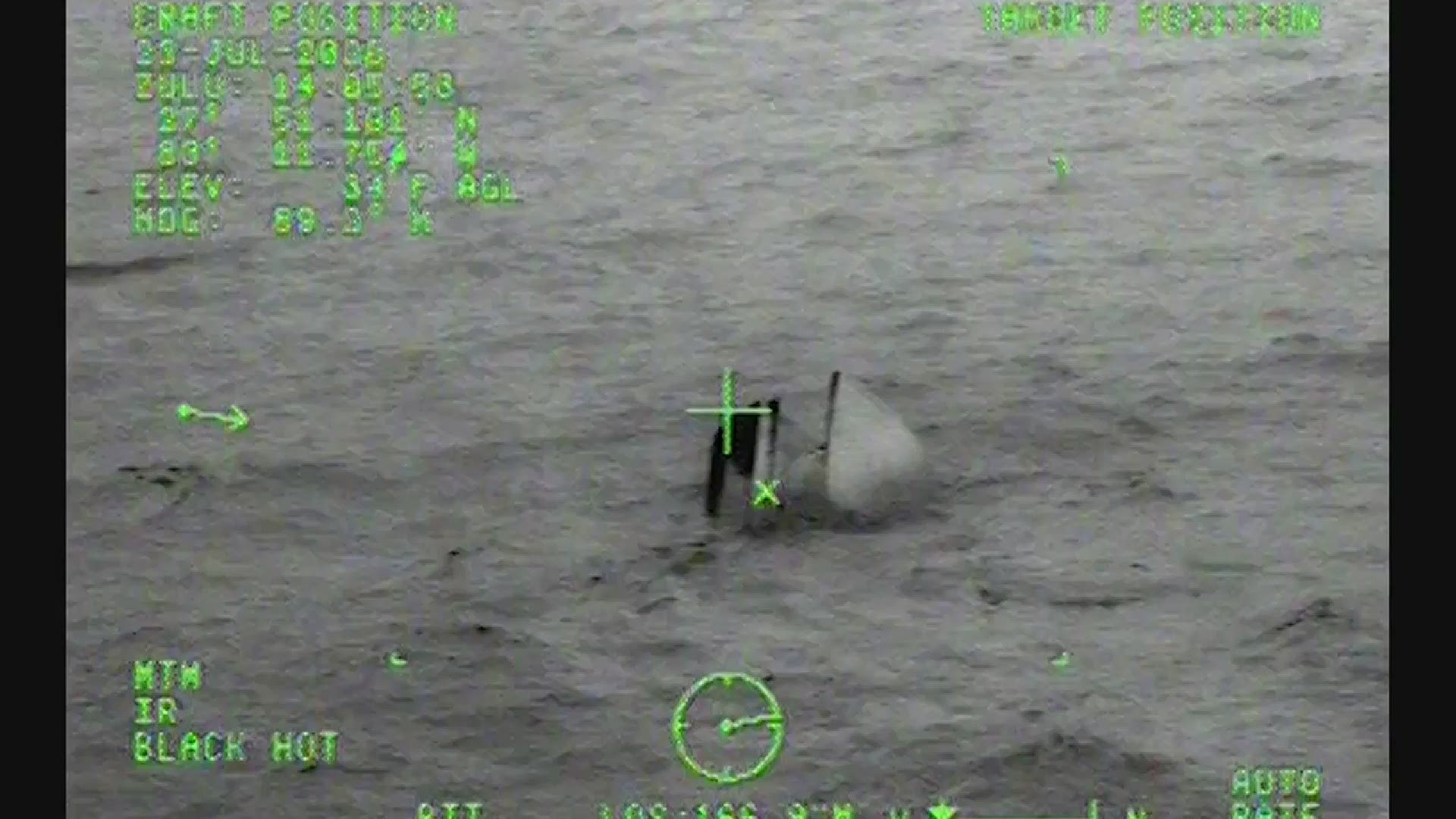 Video shared by the Coast Guards southeastern sector shows the moments a man was rescued from his capsized fishing boat.