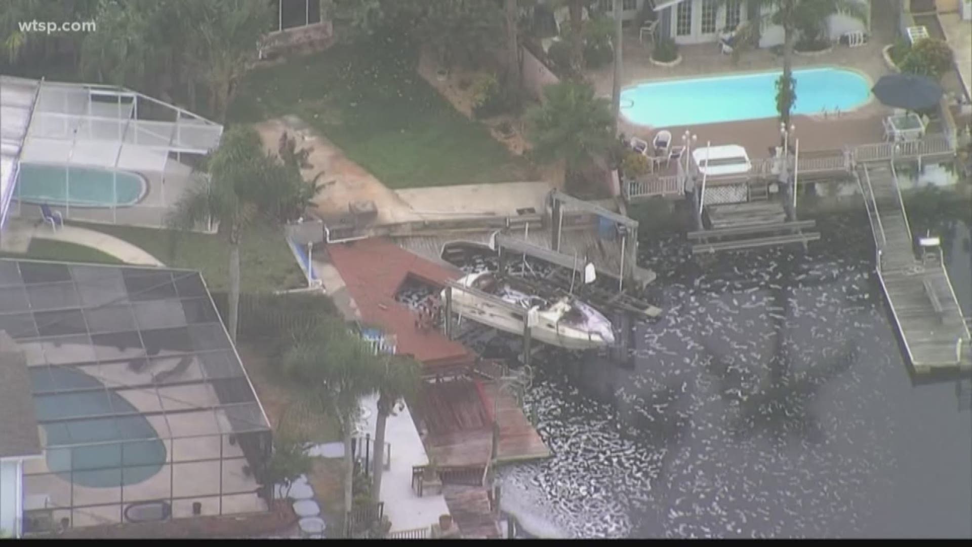 A boat on a lift somehow burst into flames, and its owner suffered serious burns, according to Pasco Fire Rescue.