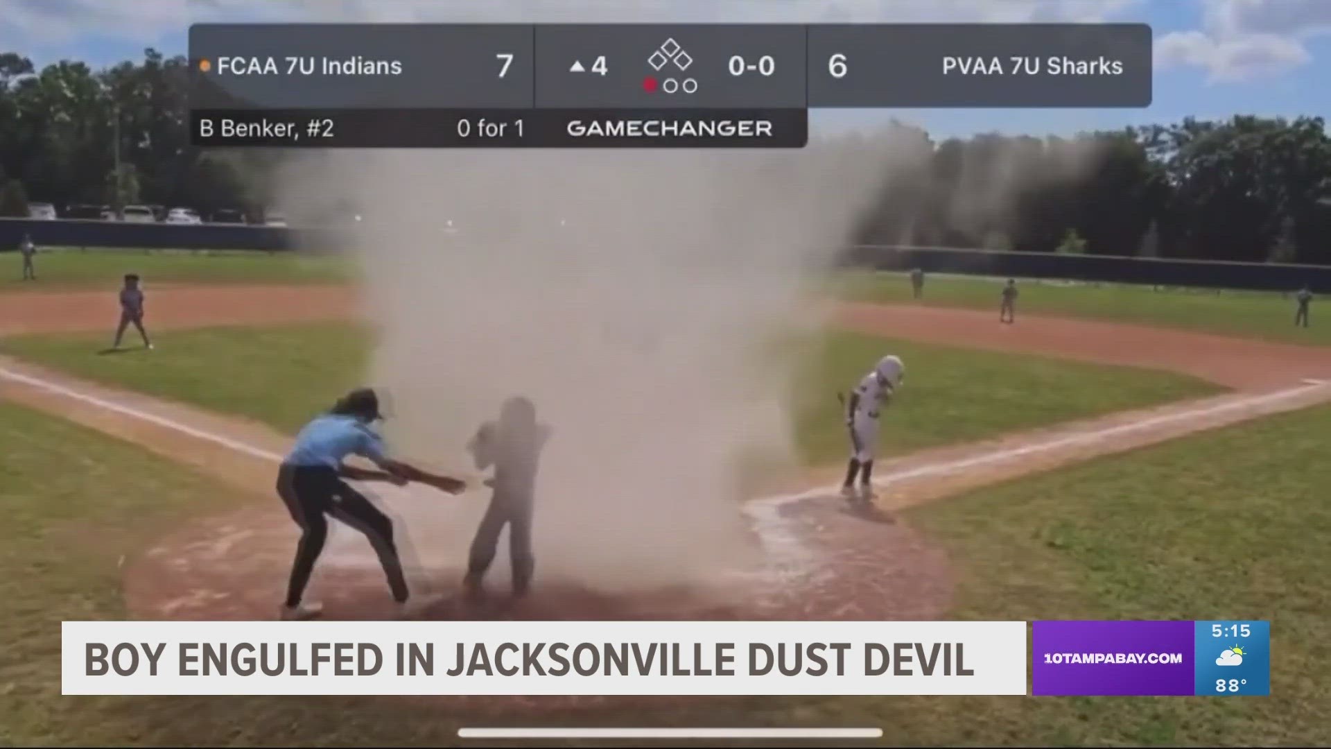 The teen umpire managed to battle the wind to save the catcher who was trapped in the dust devil.
