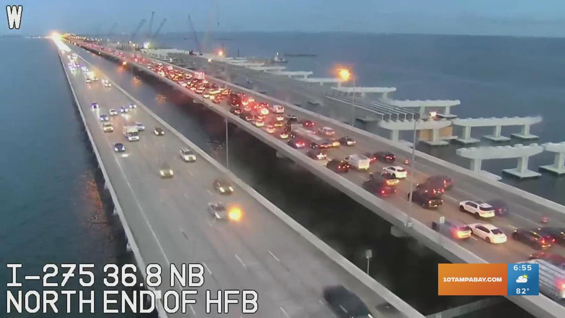 The aftermath of a car fire along the southbound lanes of Interstate 275 along the Howard Frankland Bridge is still causing major delays for commuters.