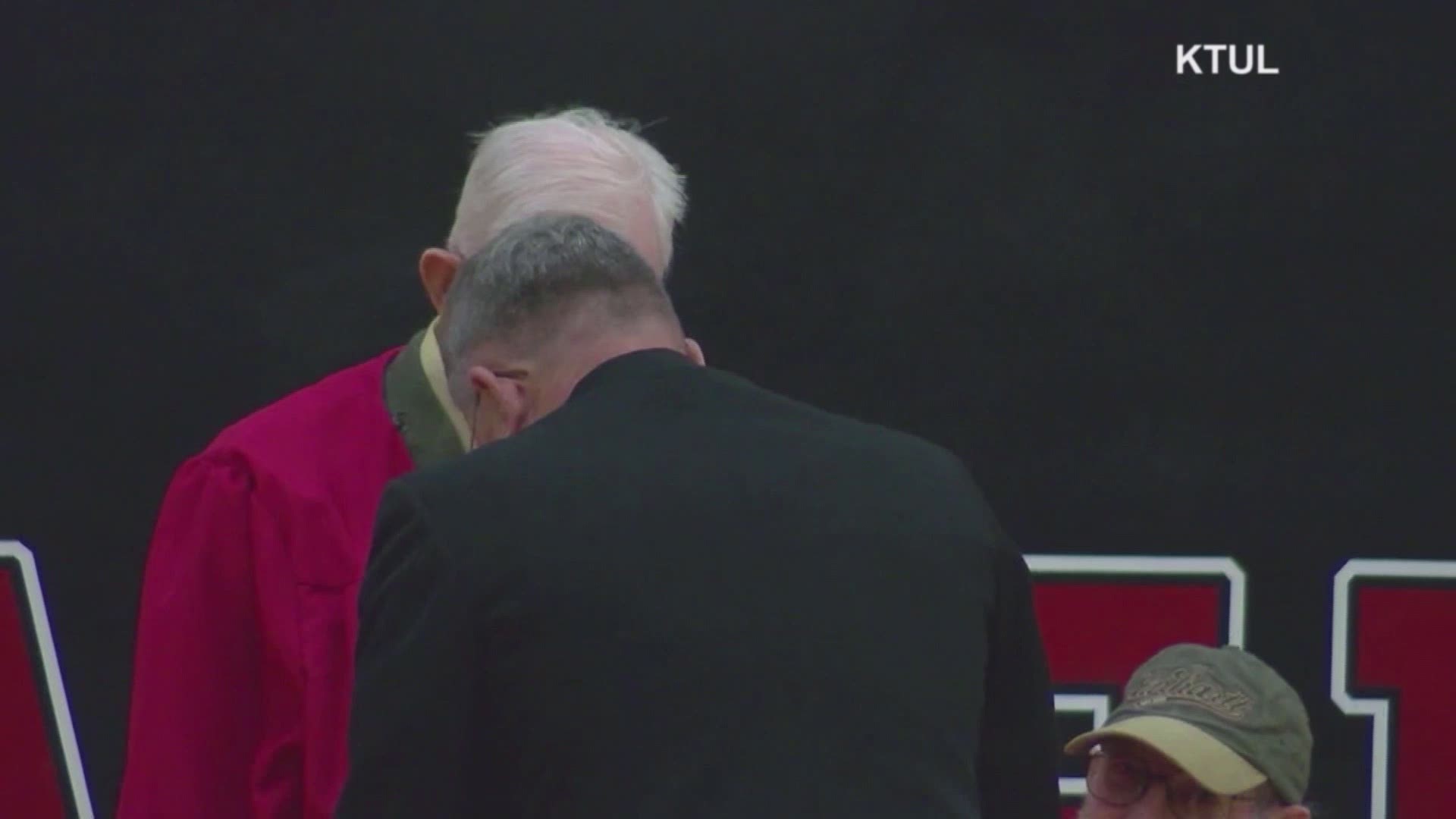 Dressed in his original Marine uniform, 95-year-old Veteran Lewie Shaw finally received his high school diploma.