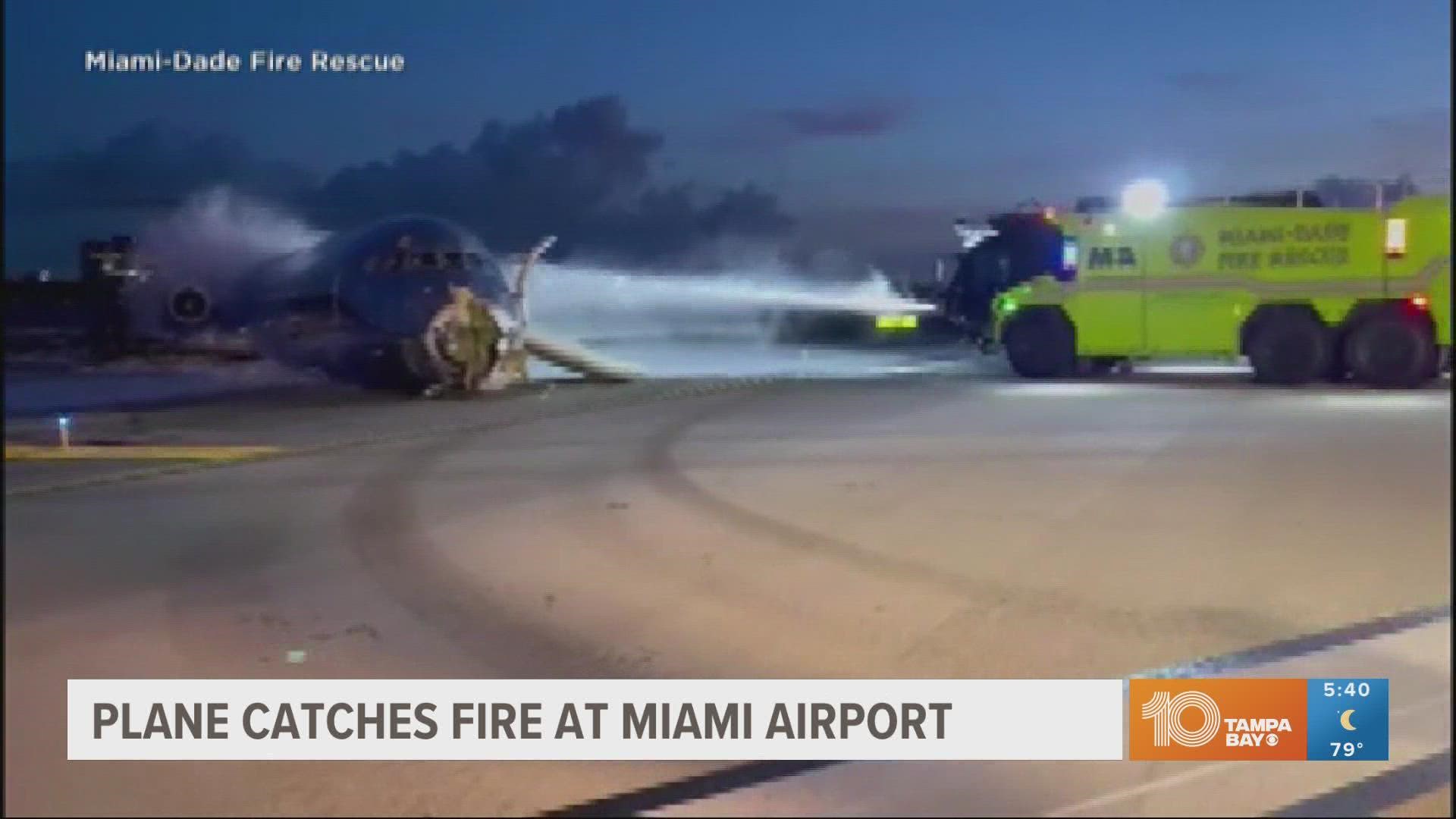 Video shows the area around the plane doused with firefighting chemicals.