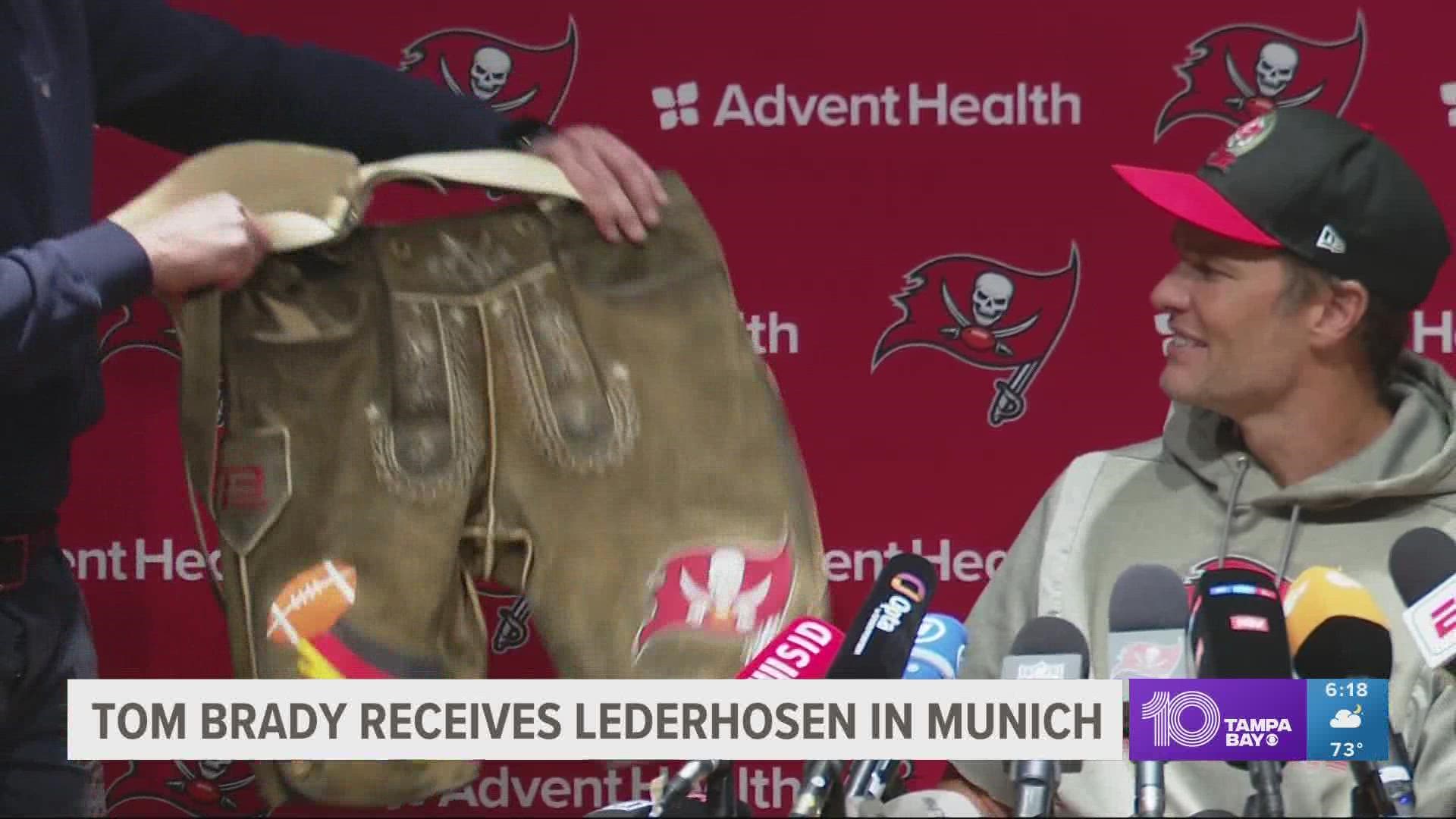 Brady has 'zero' remorse about return, is gifted lederhosen