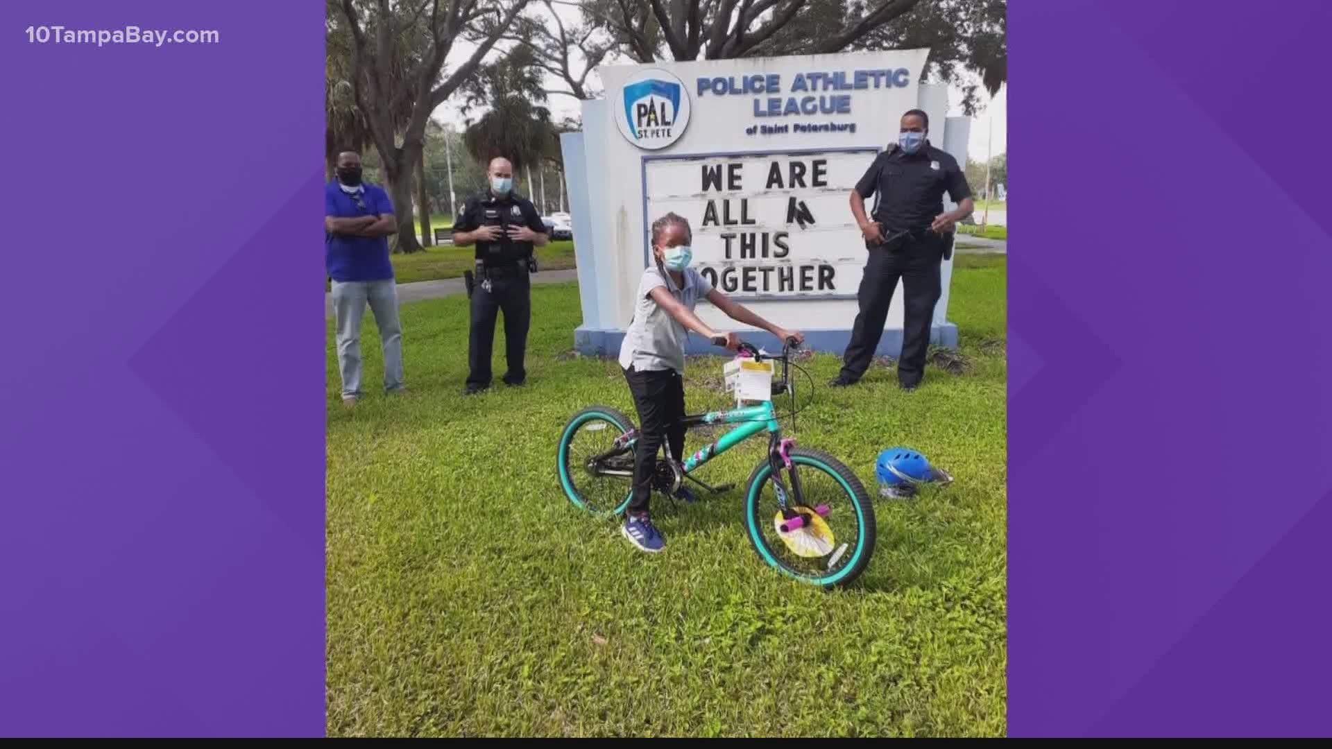 Officers surprised her with the new bike and even took it a step further by pitching in for a helmet to keep her safe.