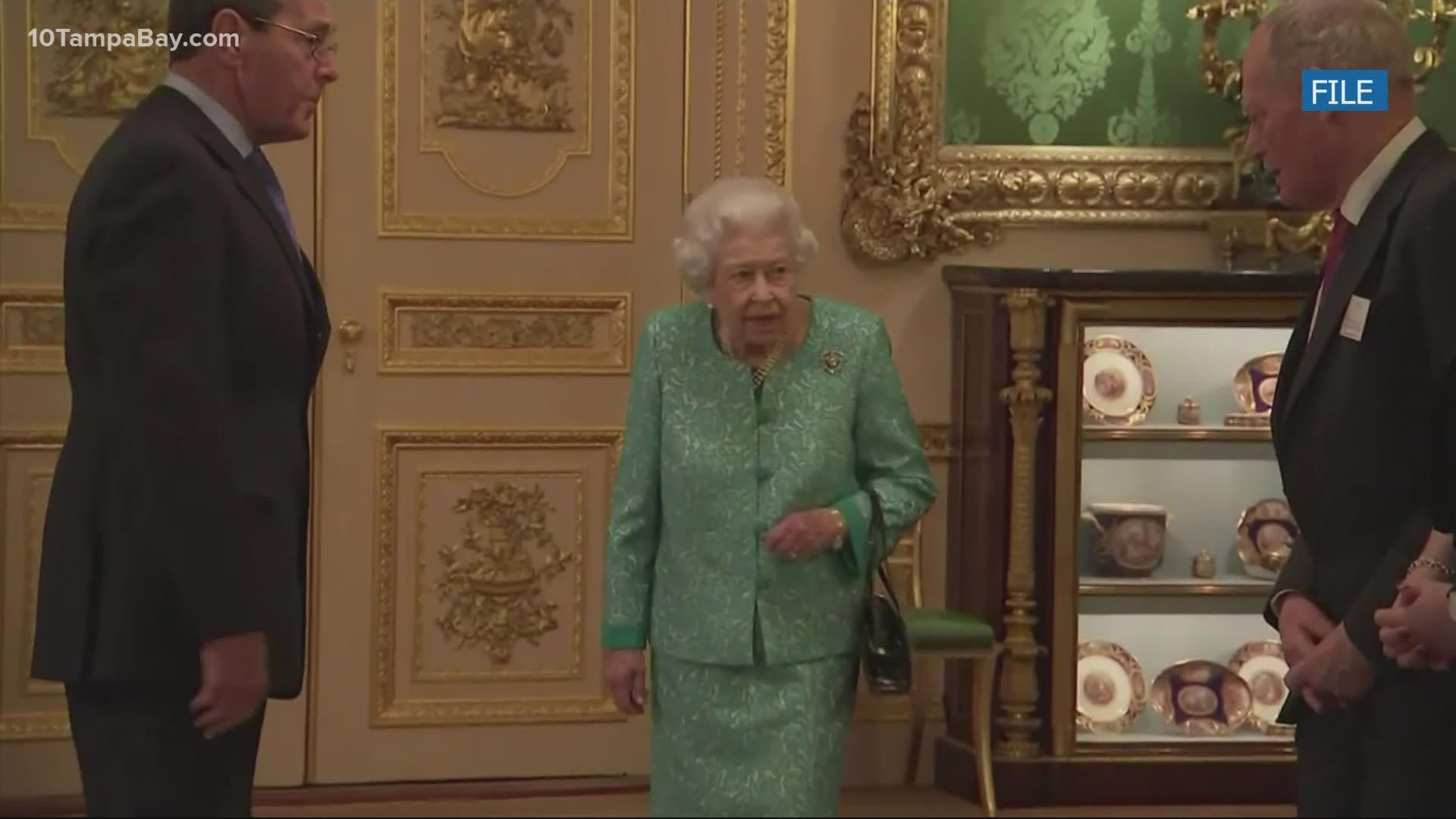 Buckingham Palace said the 95-year-old British monarch is experiencing mild, cold-like symptoms.