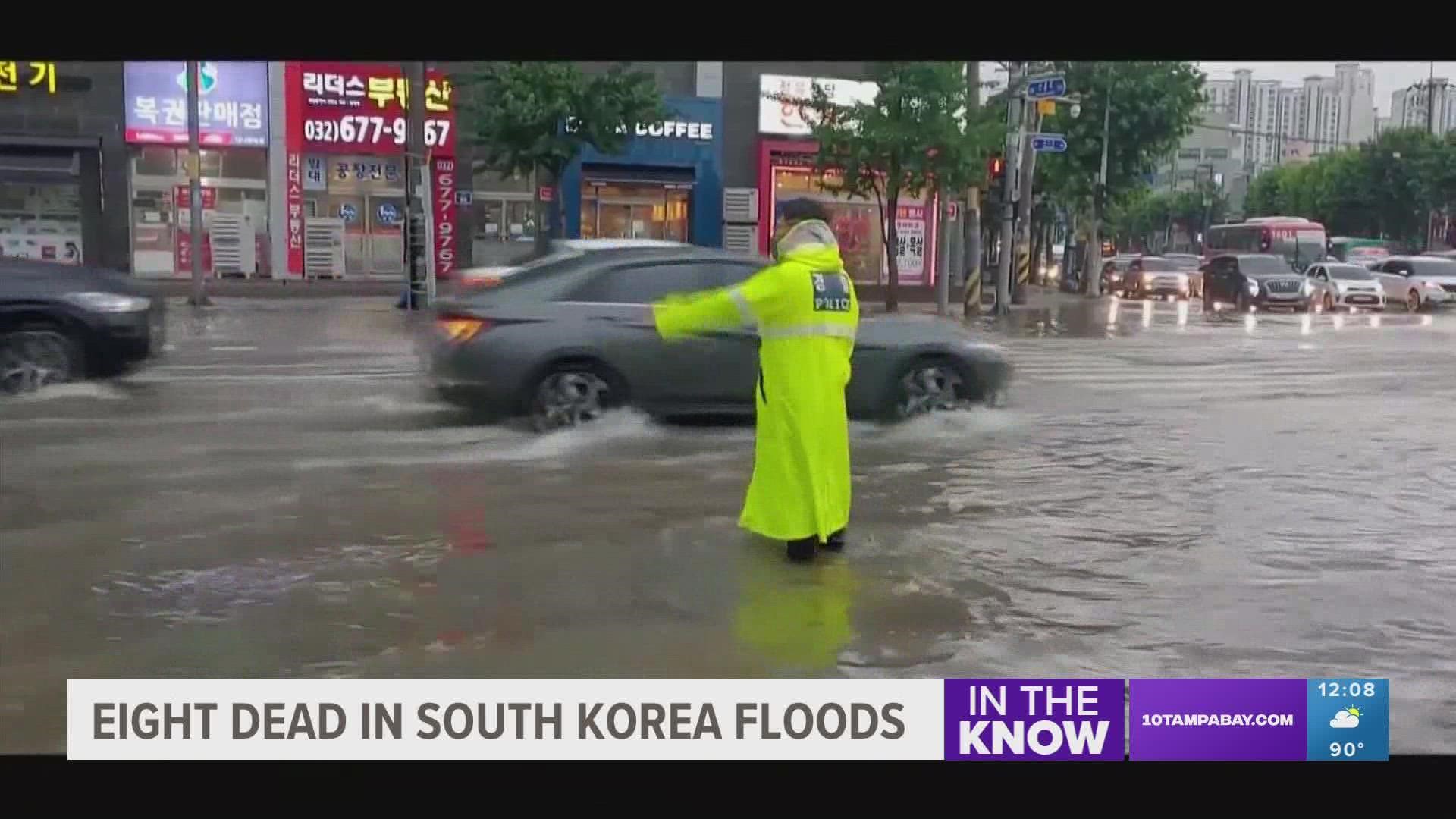 Heavy rains flooded the streets of Seoul's affluent Gangnam district, submerging vehicles and overwhelming public transport.
