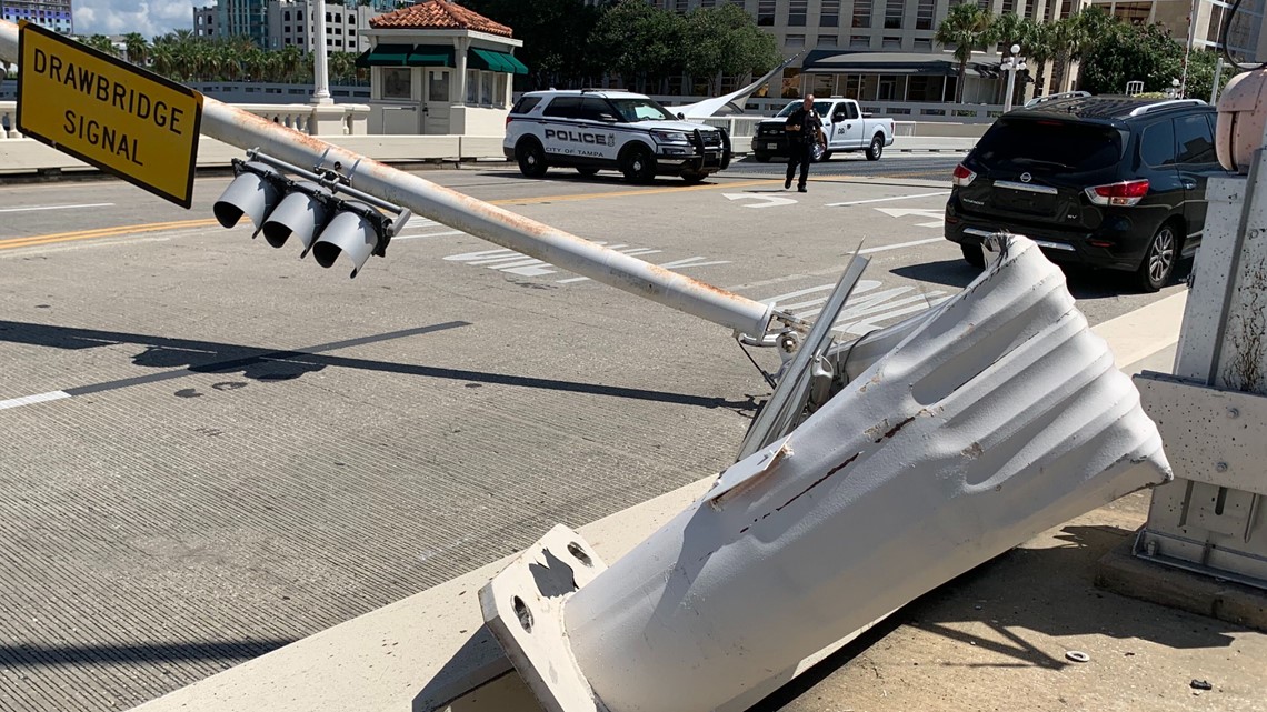 Kennedy Bridge closed in Tampa after car hits light pole