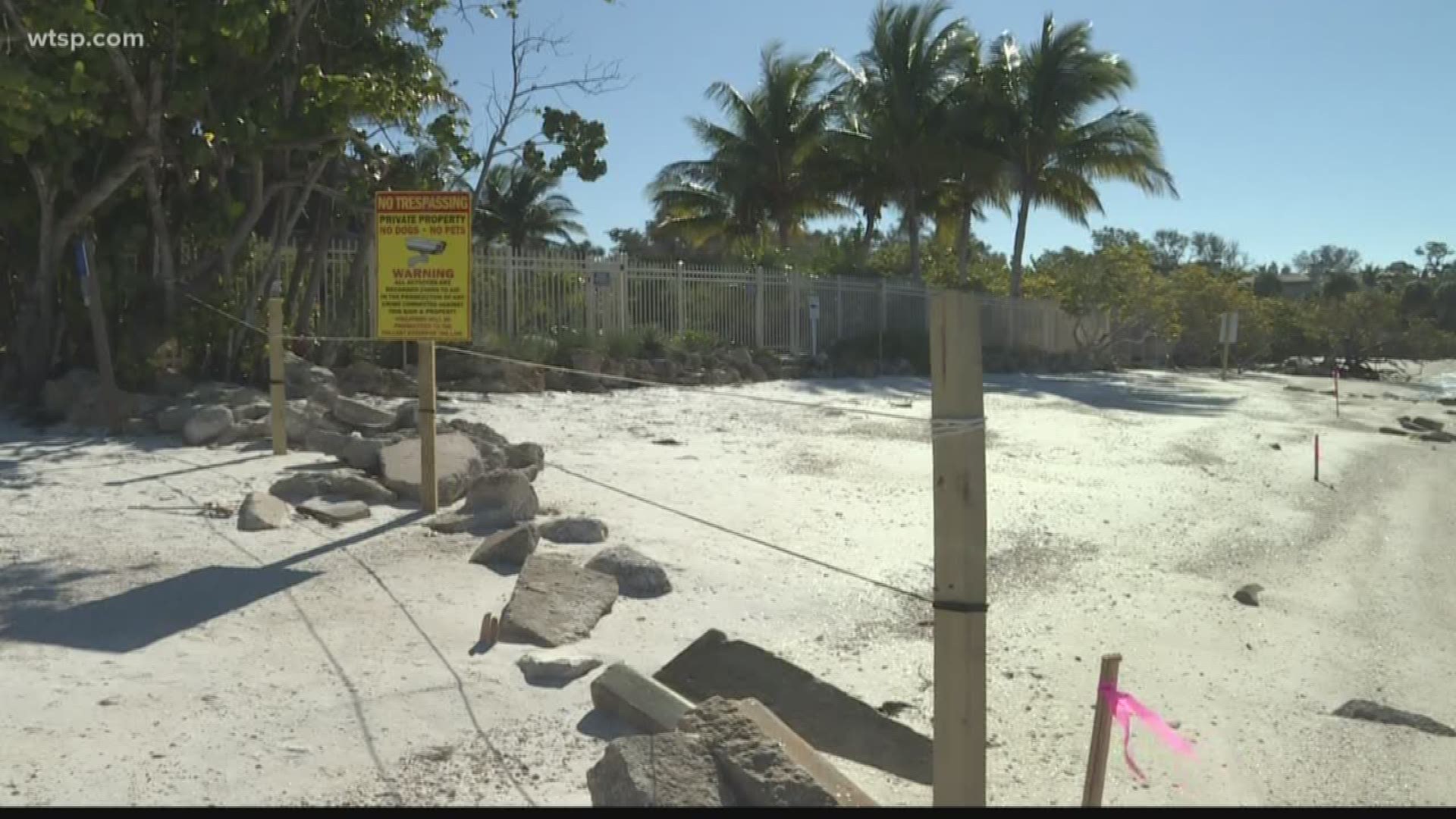 The battle continues over a rope fence, rocks and "no trespassing" signs put up on Shell Road in Siesta Key by a homeowner.