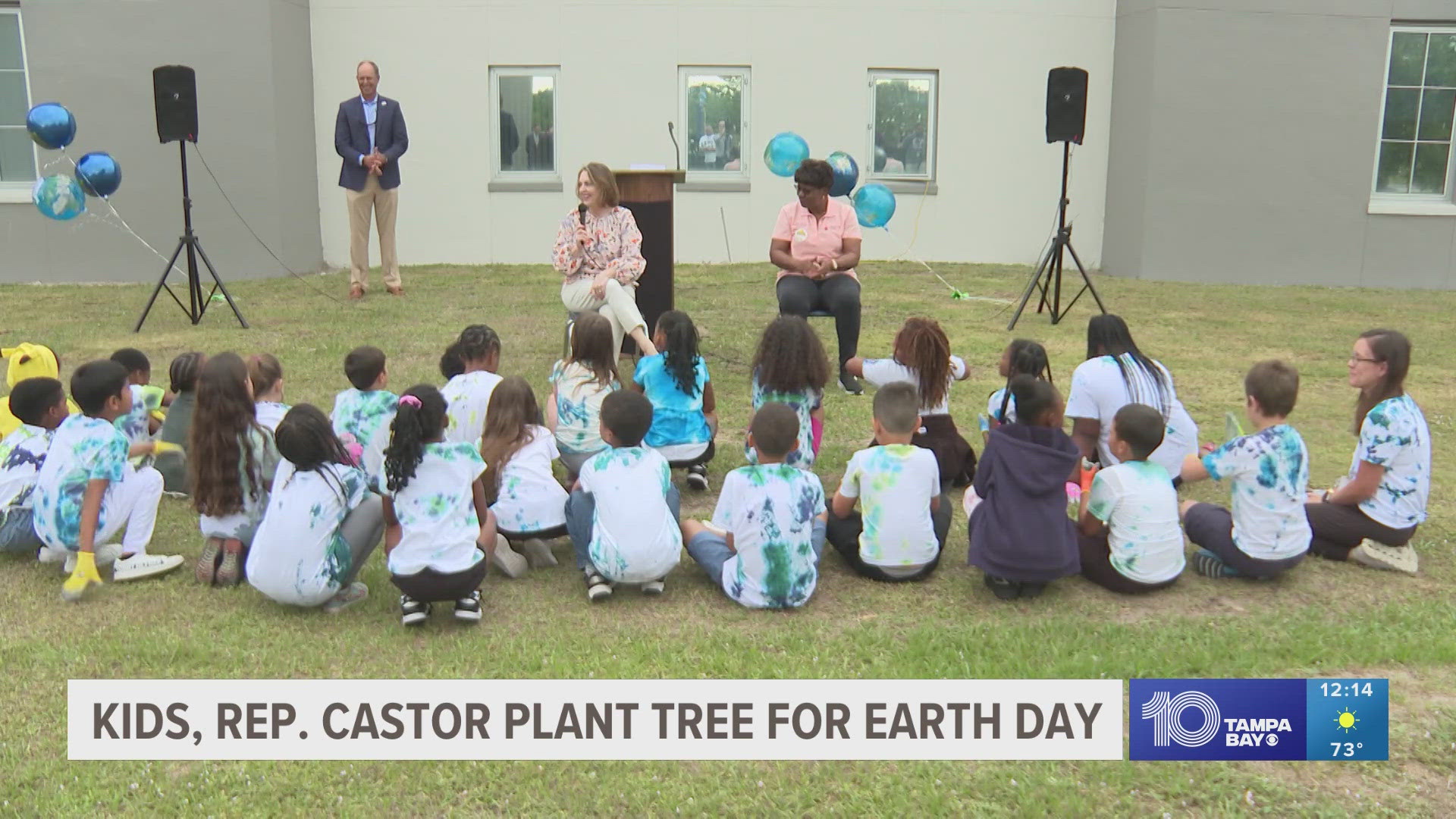 Congresswoman Kathy Castor joins second-grade students at Frost Elementary School in planting a tree, educating them about the importance of native Florida trees.