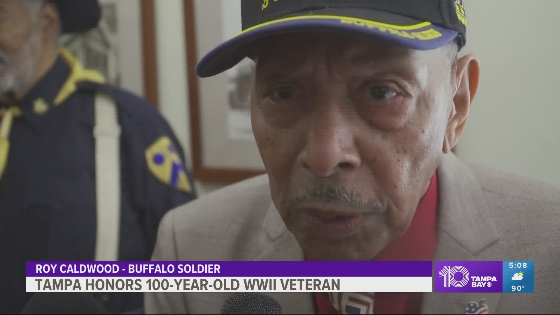 After pumping out more than a dozen push-ups, Roy Caldwood was honored by Tampa City Council.