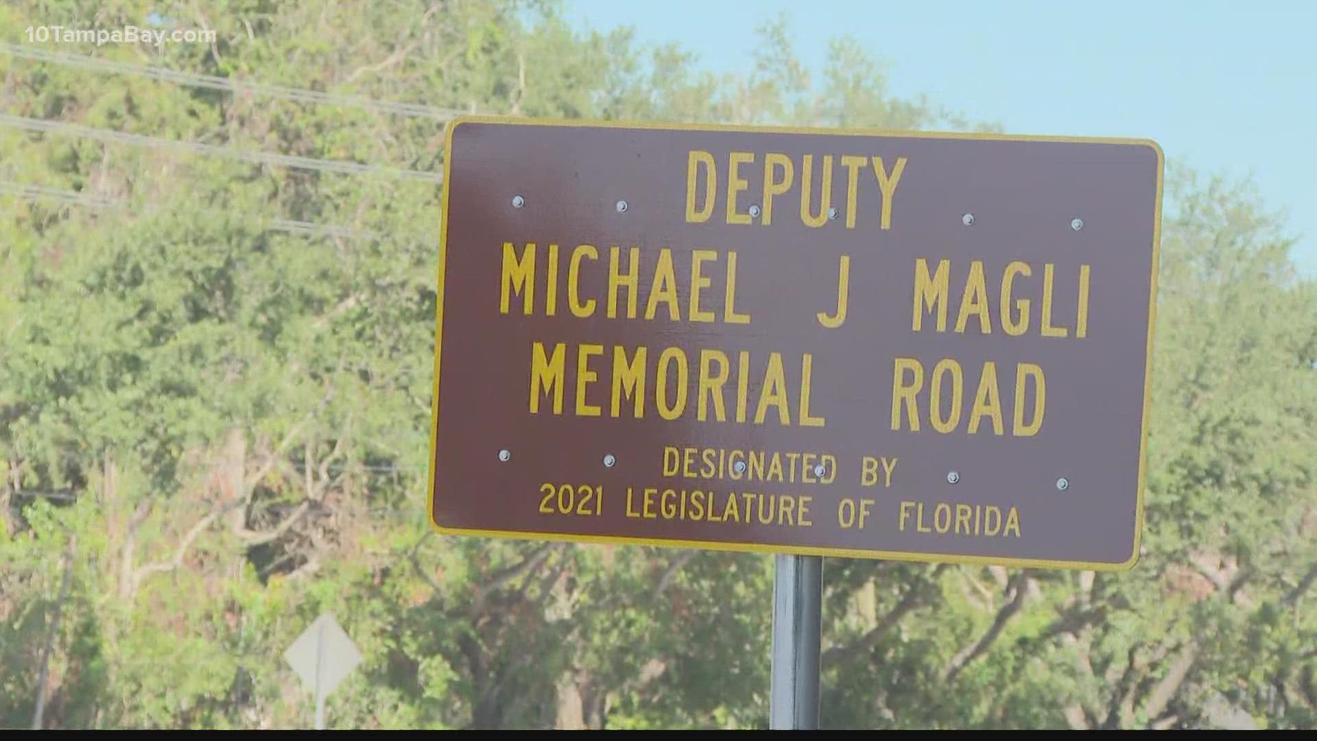 Deputy Magli's wife and kids were able to give a helping hand in uncovering the sign.