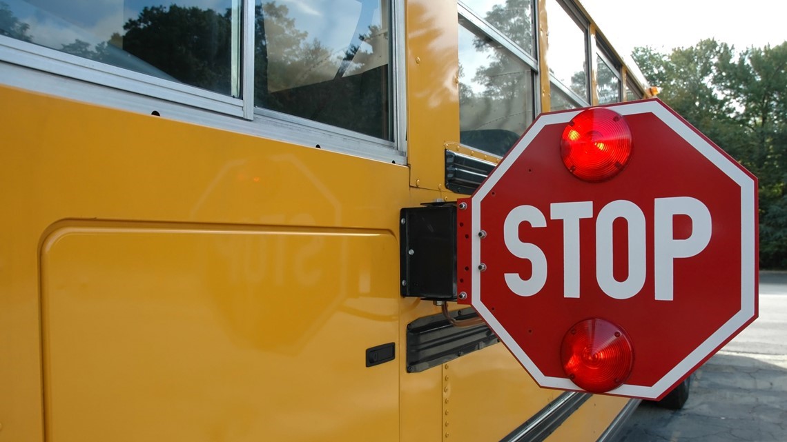 What are the rules for stopping for school buses in Florida?