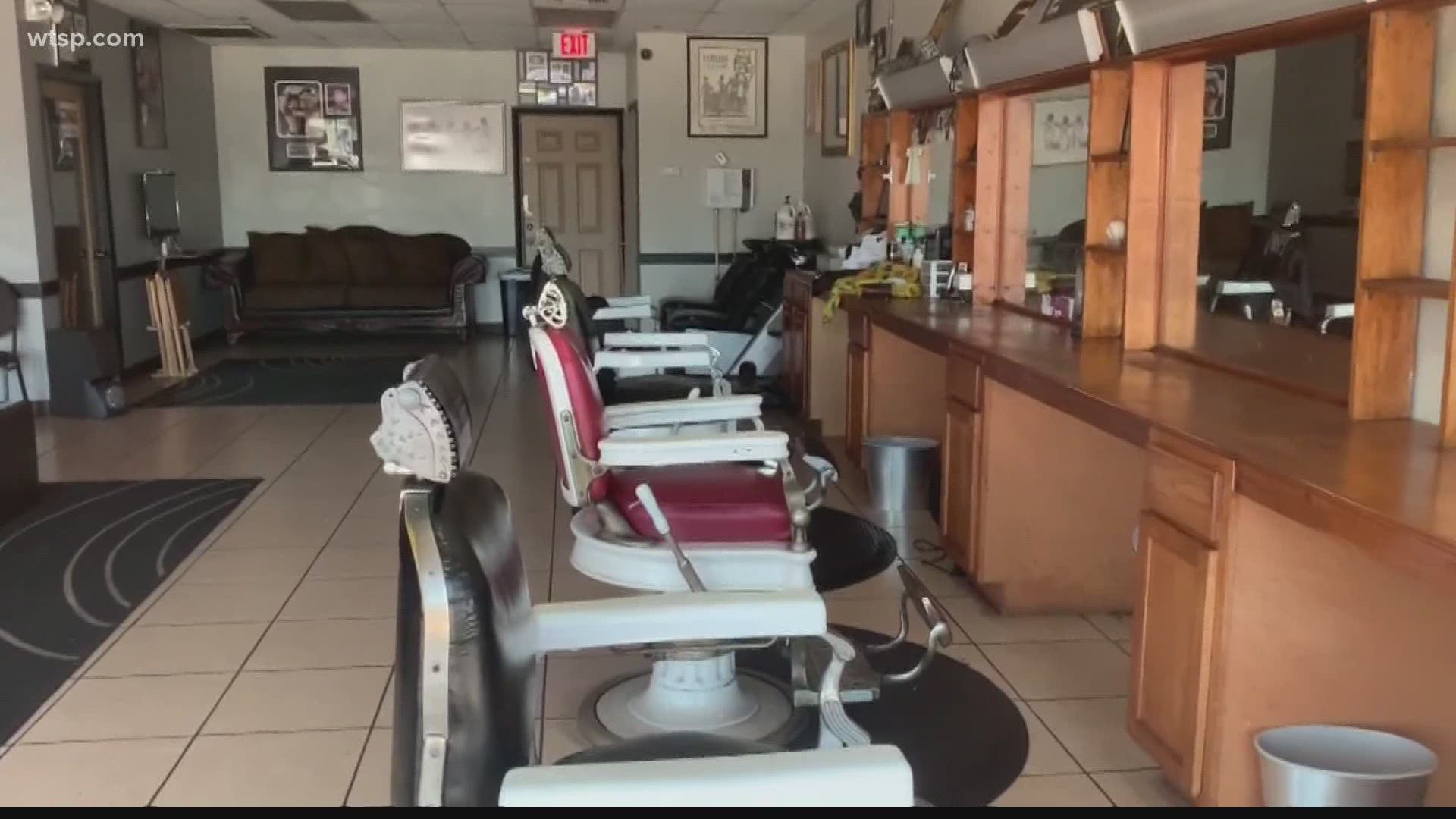 A local barber said it will take some time to build his business back to what it was before.