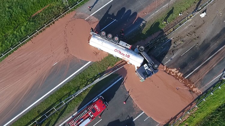 A sticky mess: tons of liquid chocolate spills onto Polish highway A sticky mess: tons of liquid chocolate spills onto Polish highway
